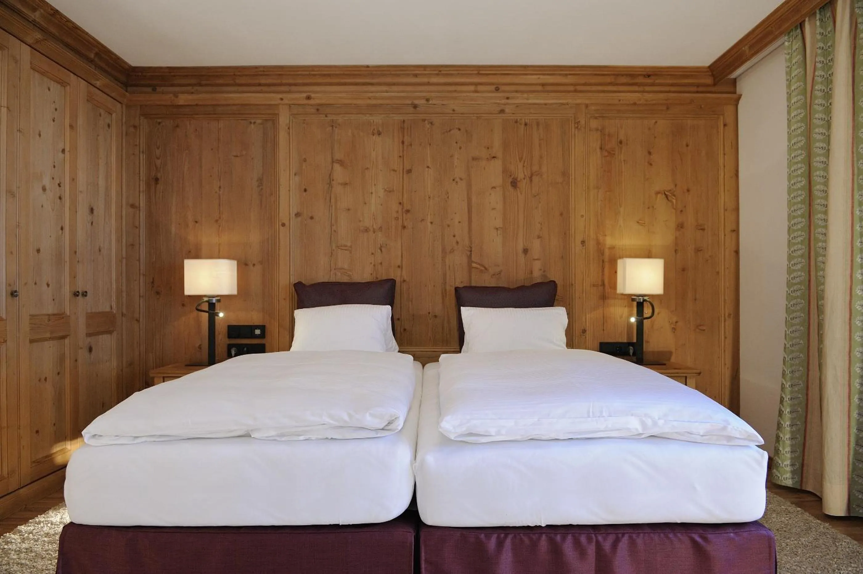 Bedroom in Hotel Garni Albona