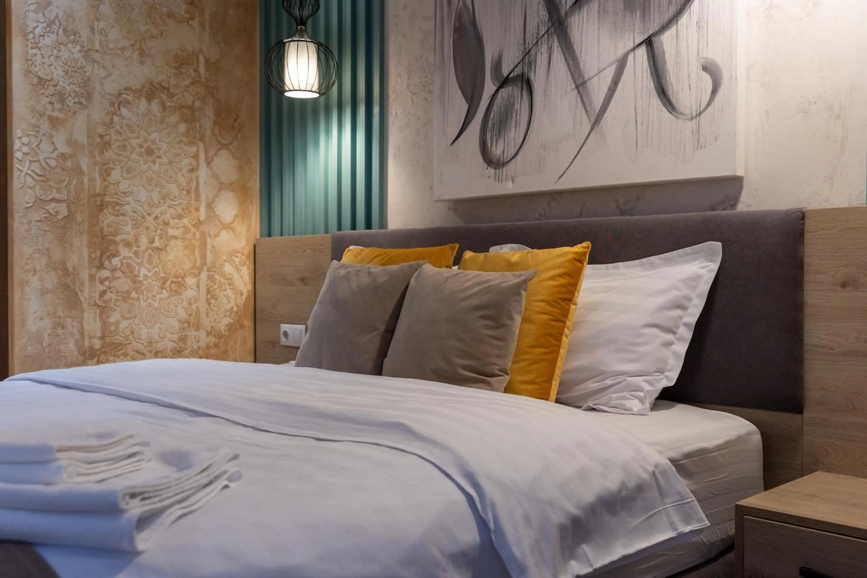 Bed in Lumiere House Sibiu