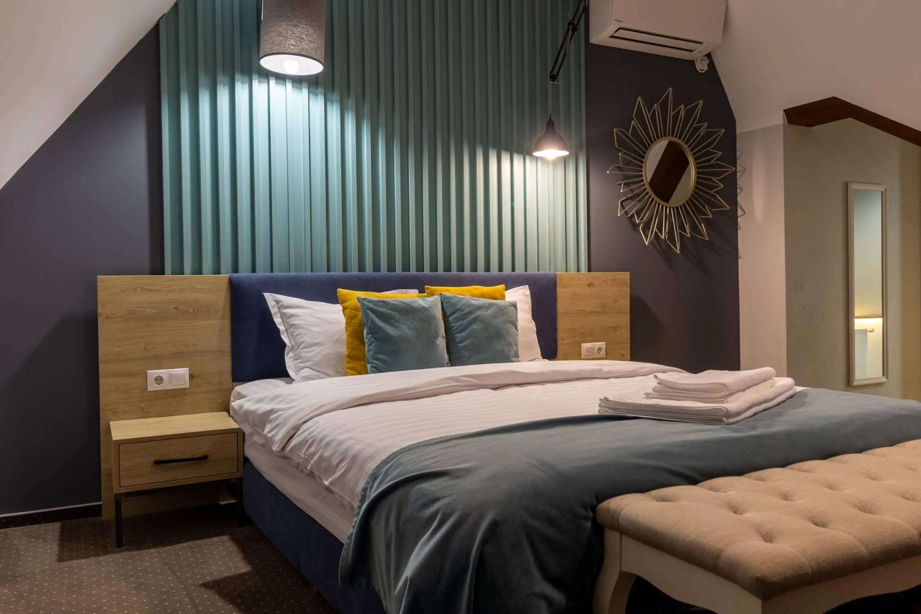 Photo of the whole room, Bed in Lumiere House Sibiu