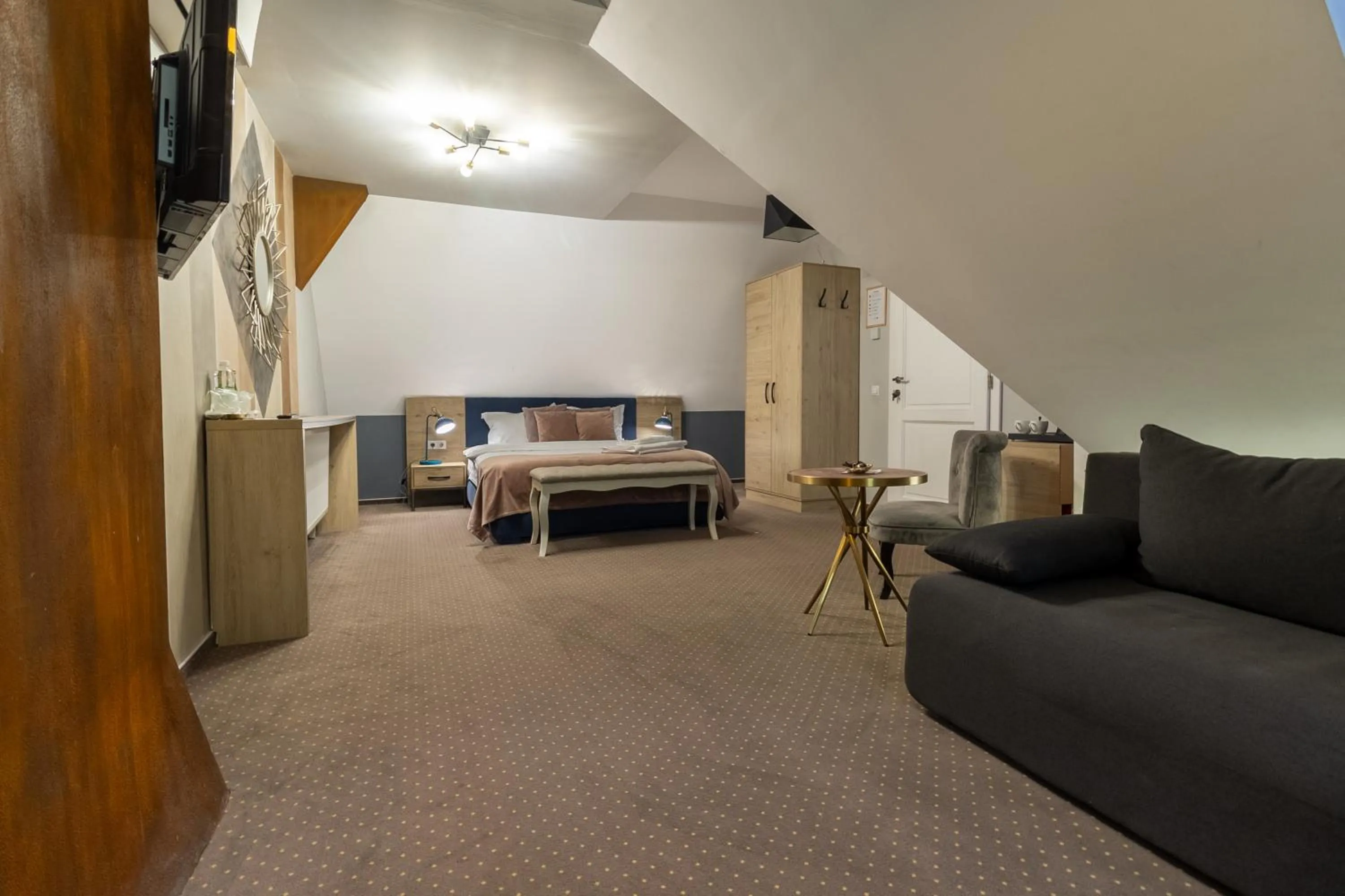 Photo of the whole room, Bed in Lumiere House Sibiu