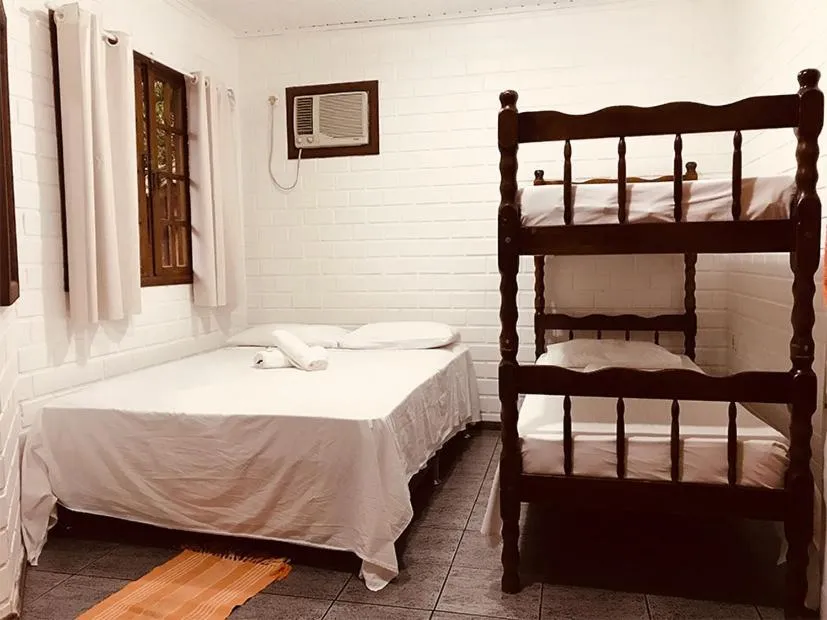 Bed in Pousada Halliny do Rosa