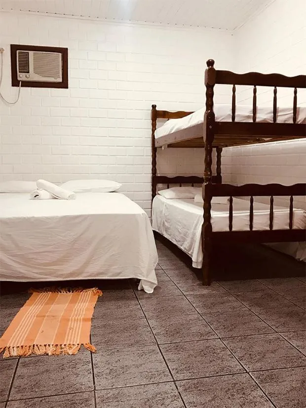 Bed in Pousada Halliny do Rosa