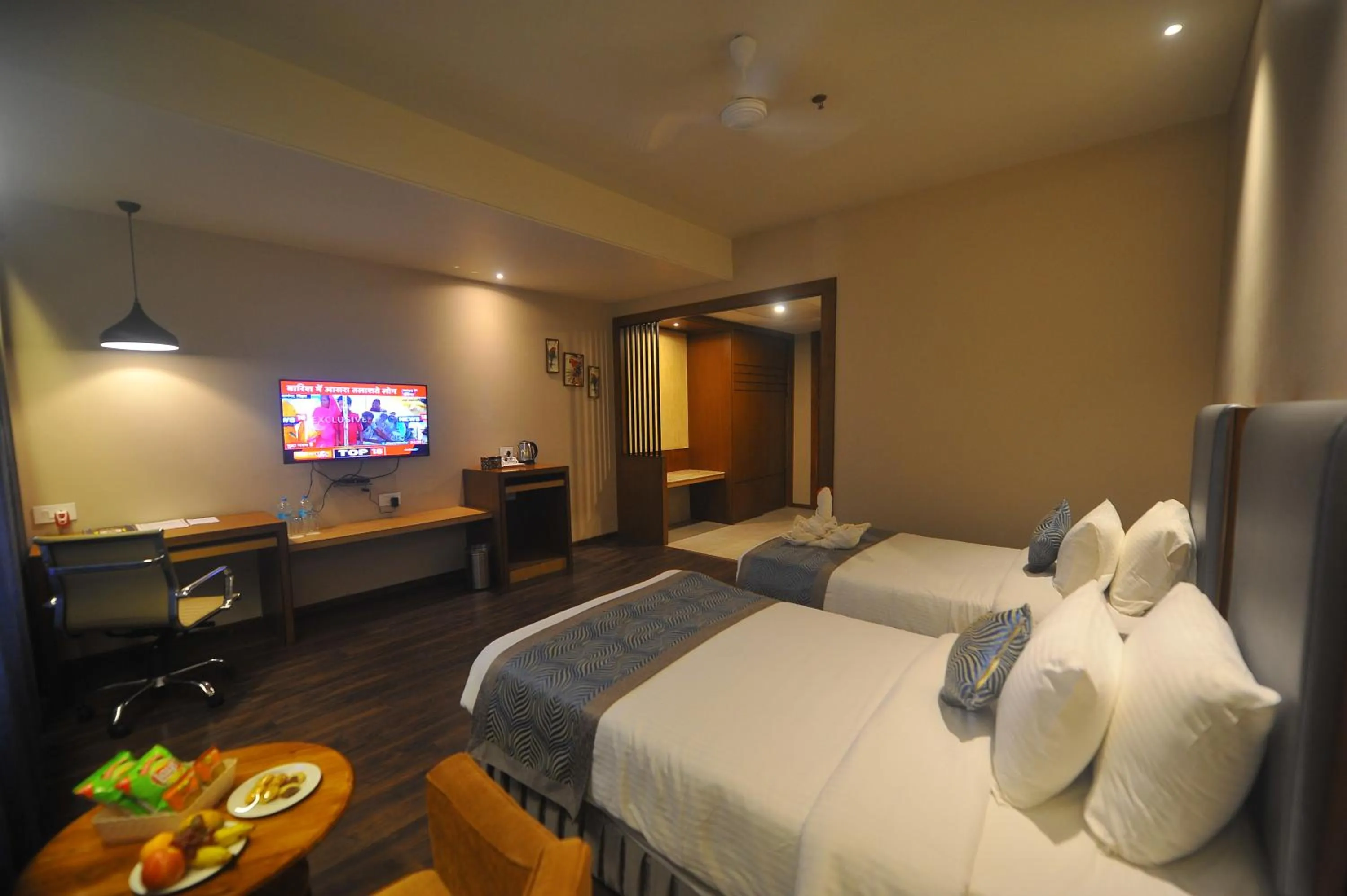 Bed in Pipul Padmaja Premium Hotel