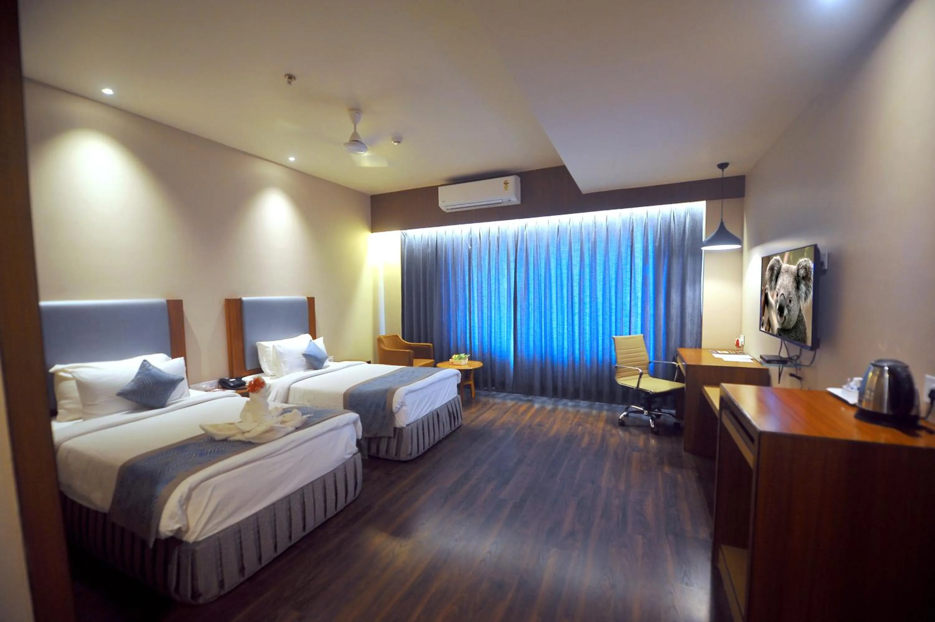 Bed in Pipul Padmaja Premium Hotel
