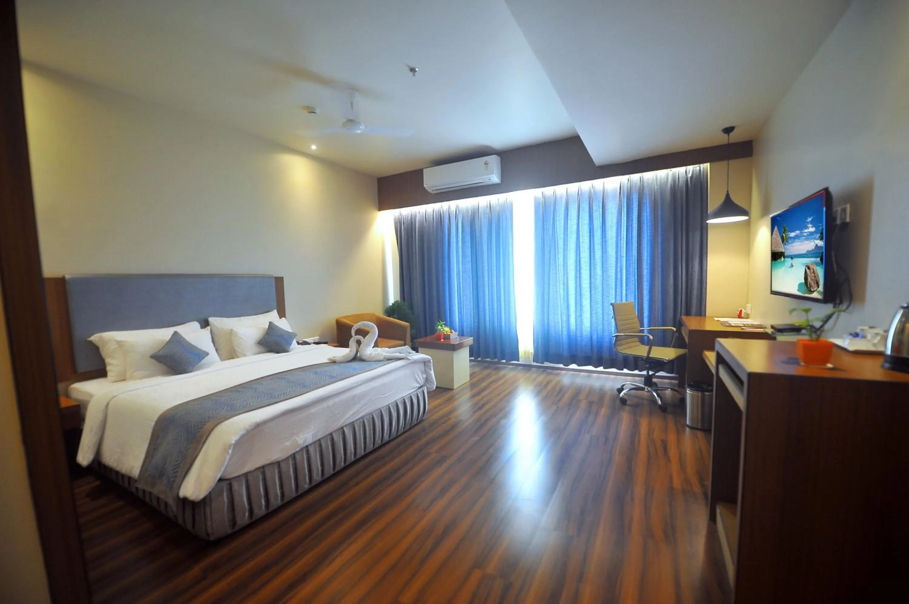 Bed in Pipul Padmaja Premium Hotel