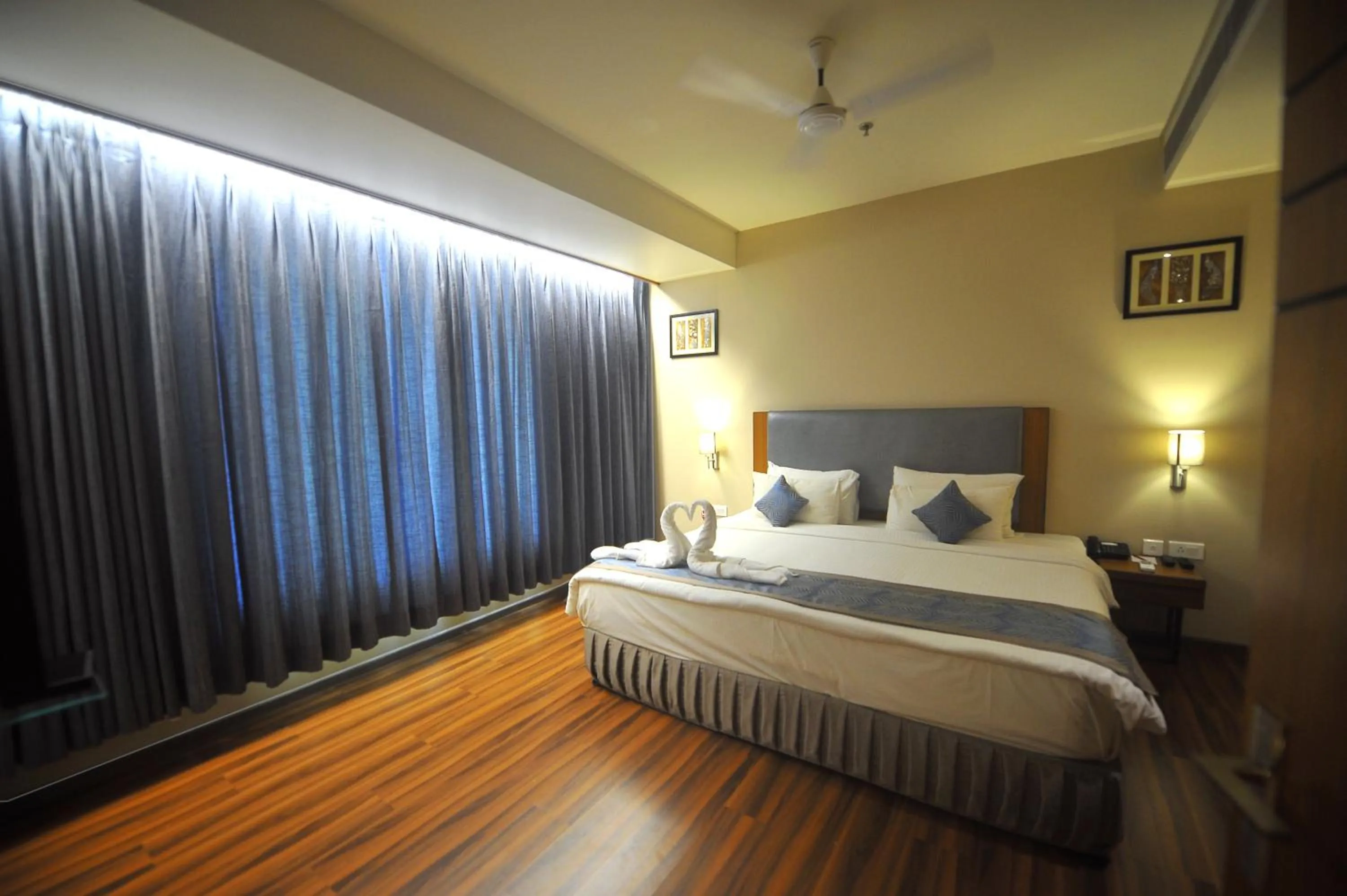 Bed in Pipul Padmaja Premium Hotel