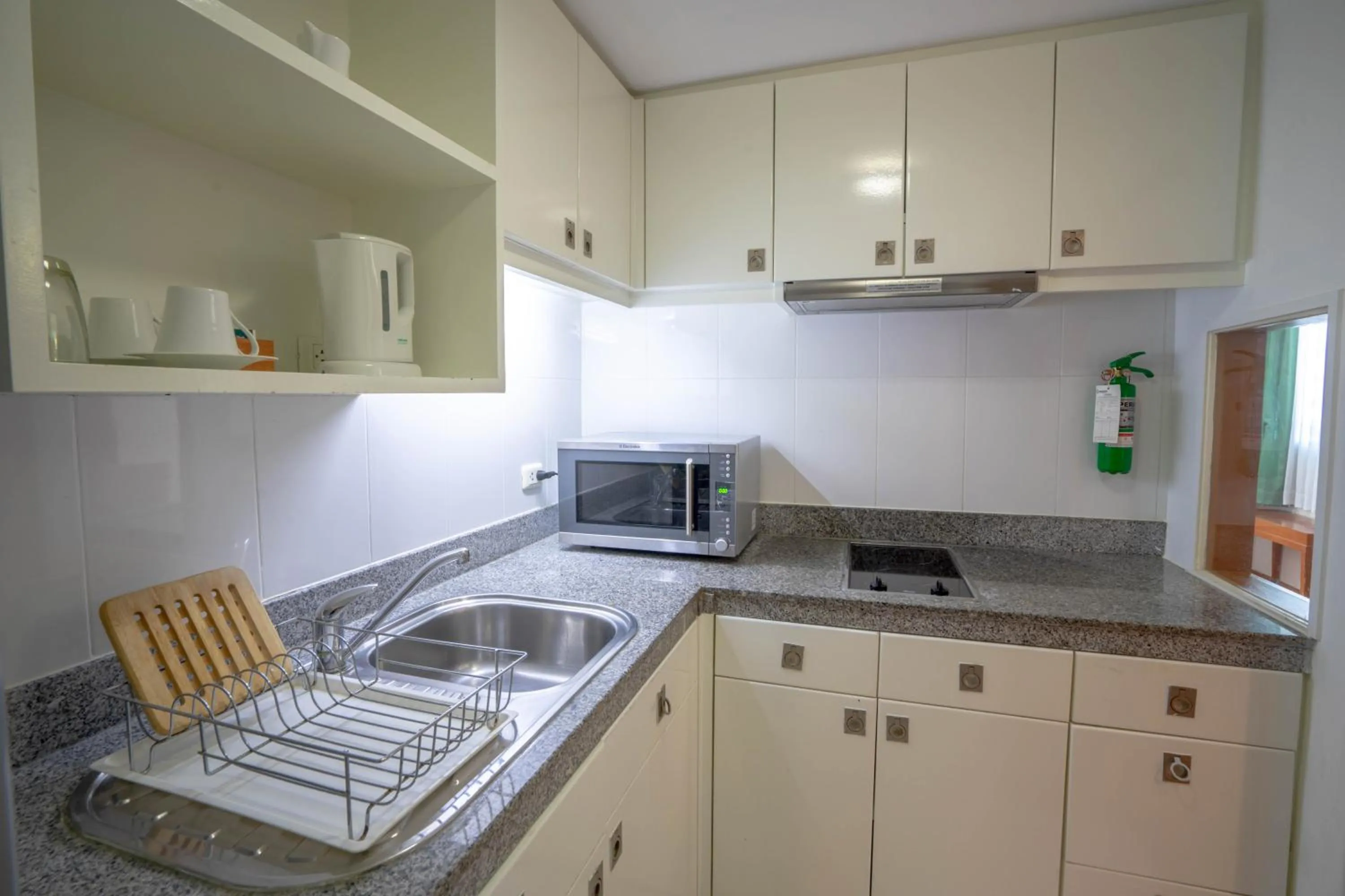 kitchen in AT EASE saladaeng by AETAS