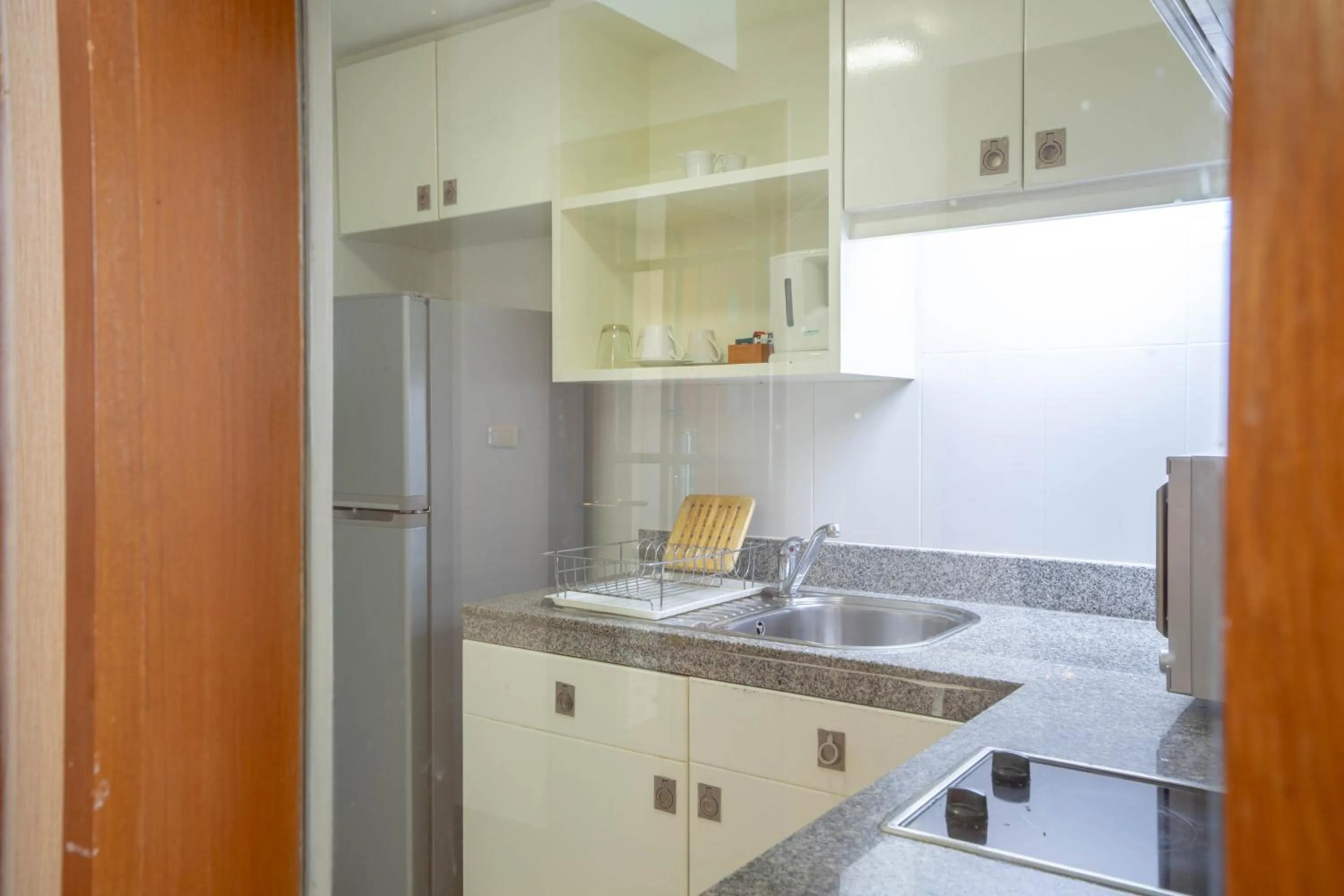 kitchen in AT EASE saladaeng by AETAS