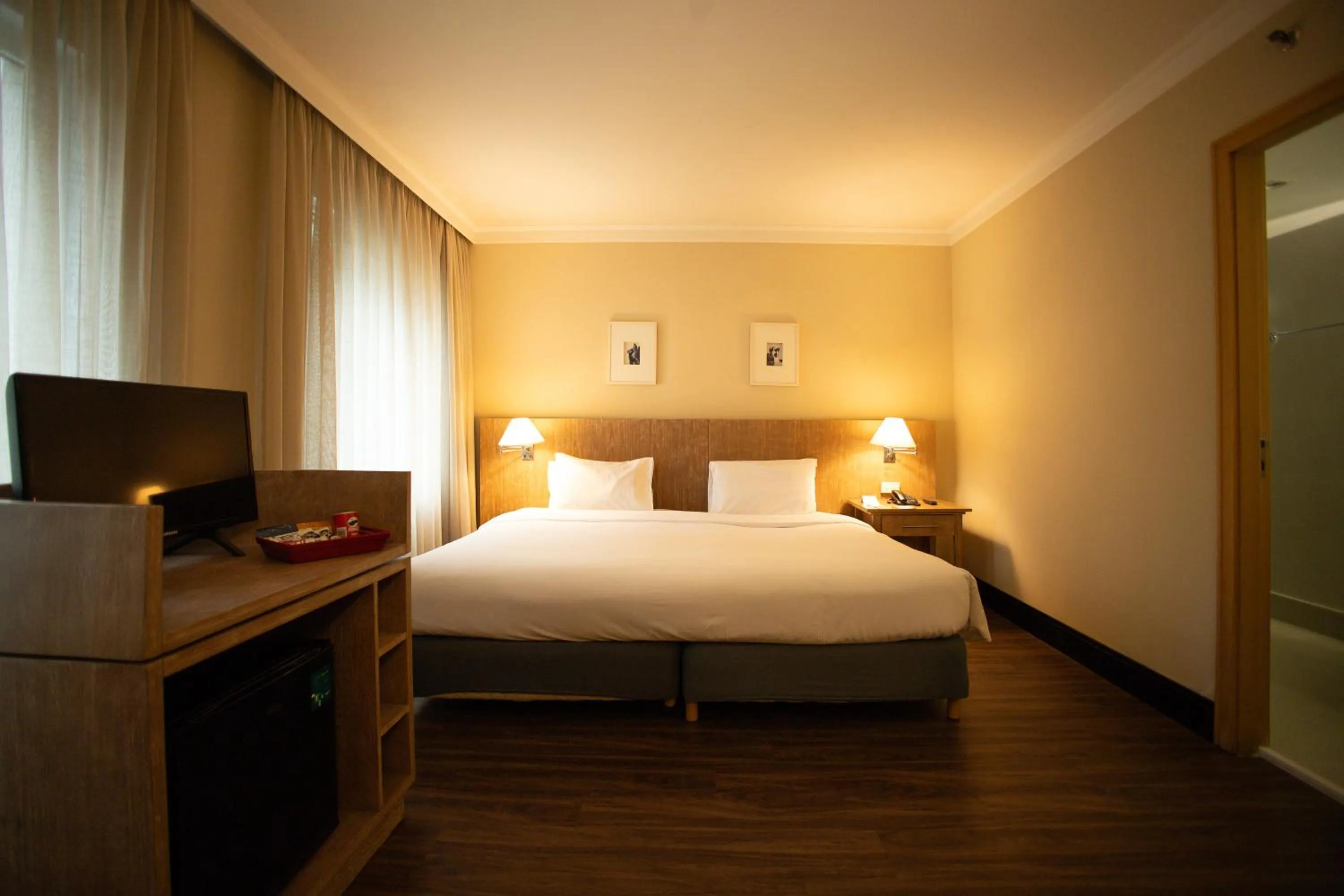 Bed in Park Inn by Radisson Berrini