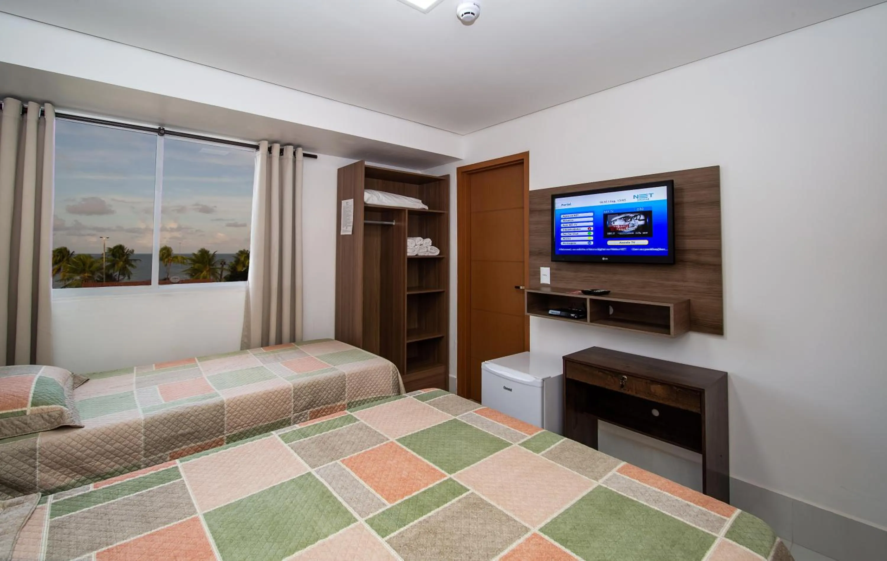 Bed in Tambau Beach Hotel