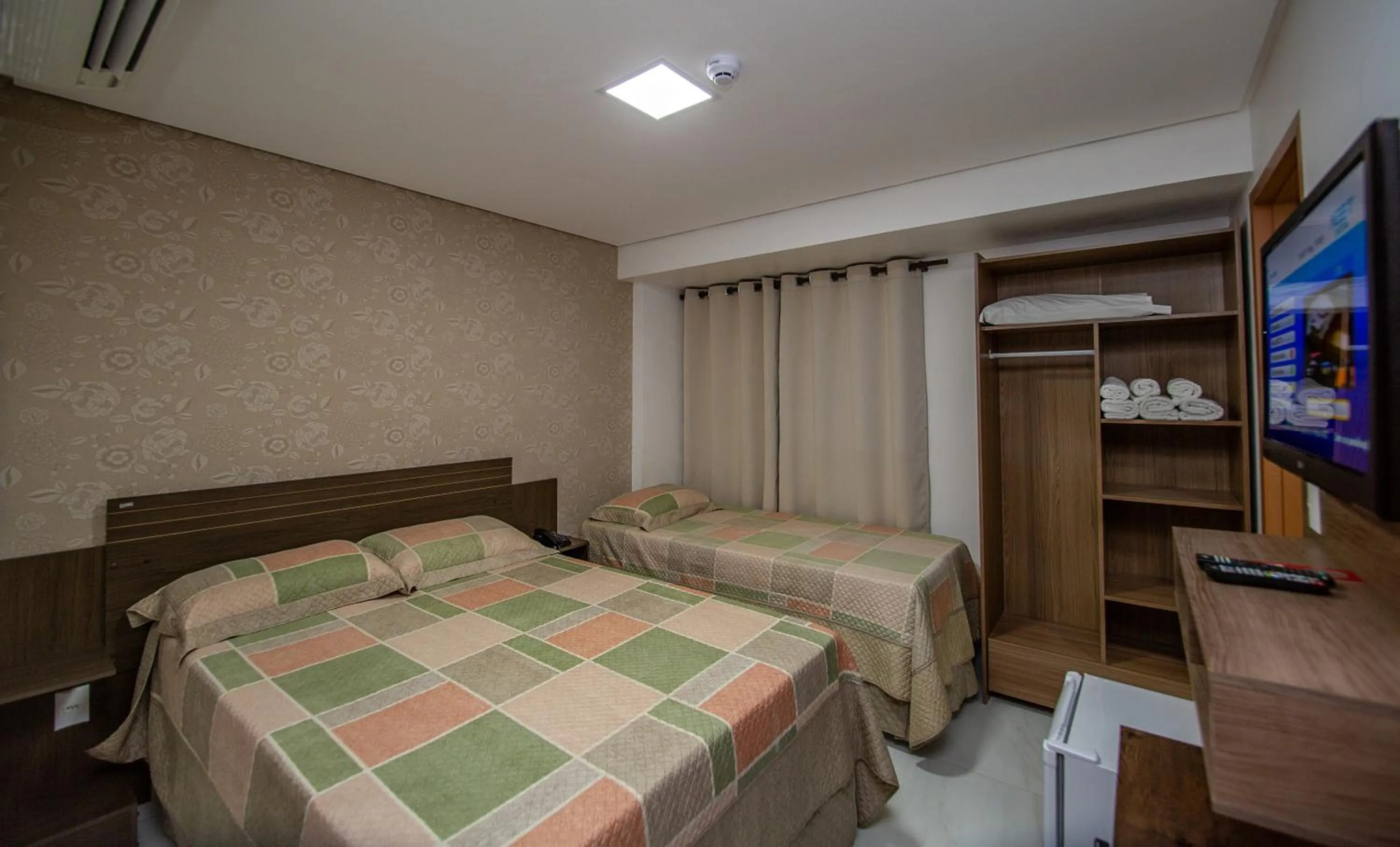 Bed in Tambau Beach Hotel