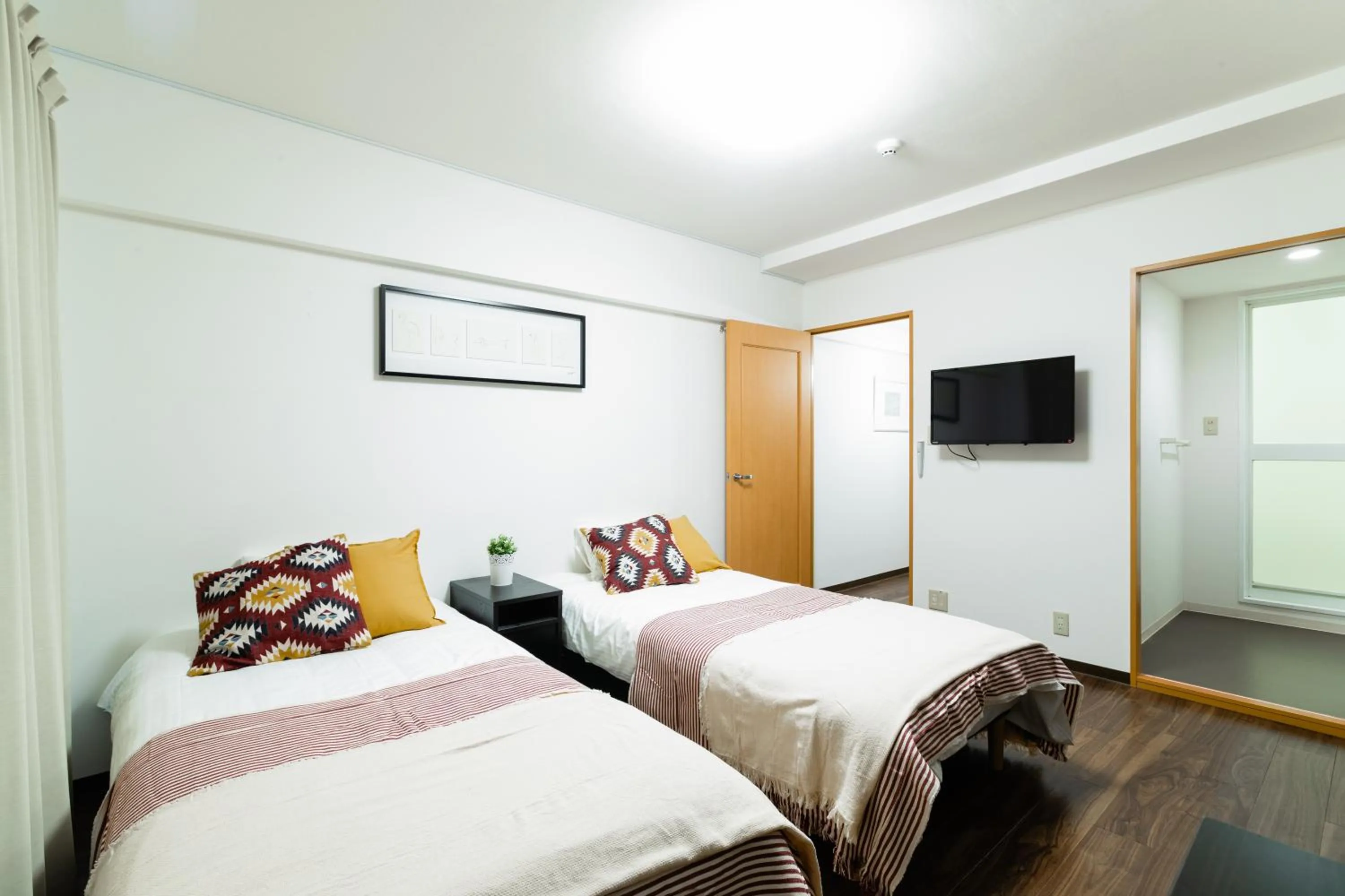 Bed in GuestHouse MIYABI