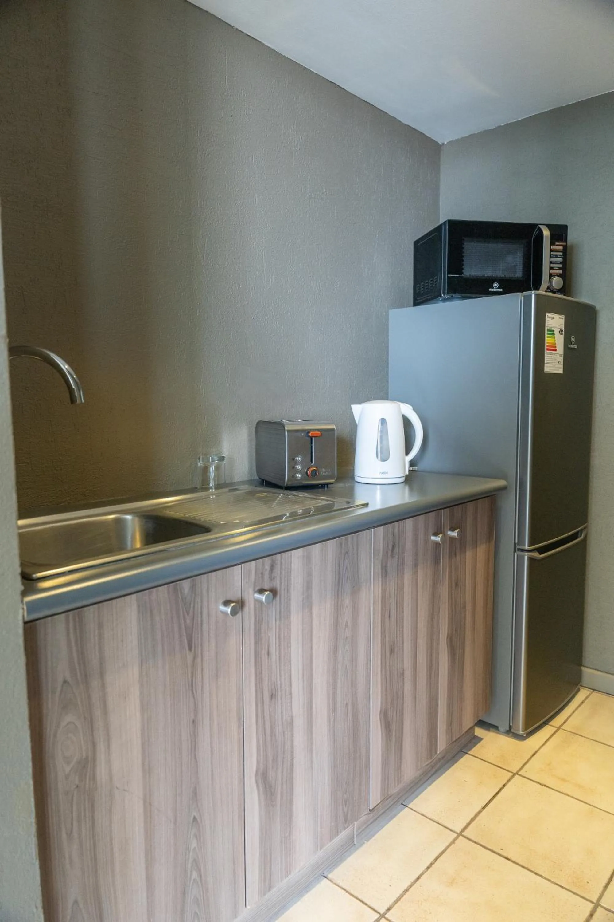 Kitchen or kitchenette in Studio 56 Apart Hotel by Terrado Iquique