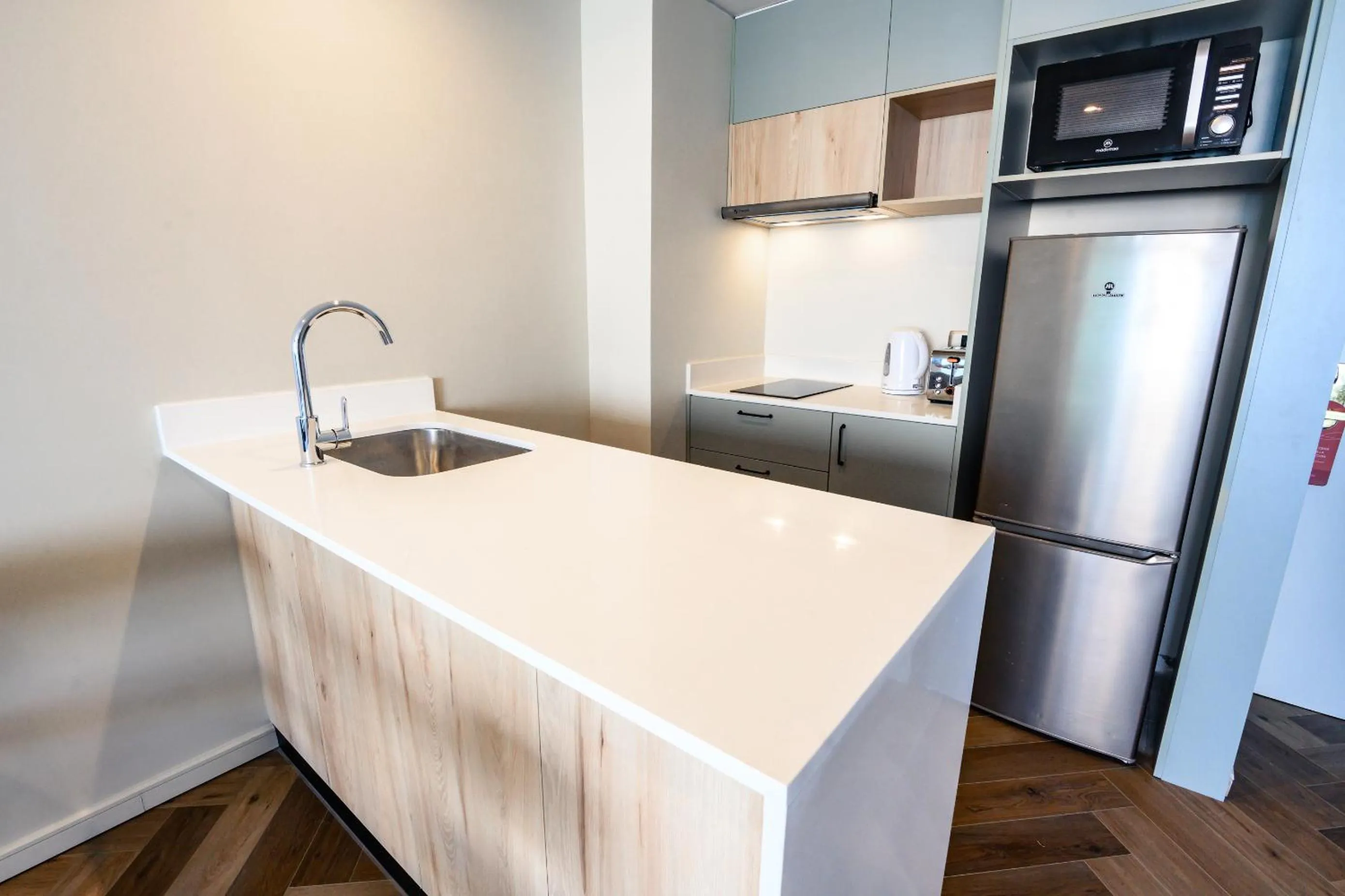 Kitchen or kitchenette in Studio 56 Apart Hotel by Terrado Iquique