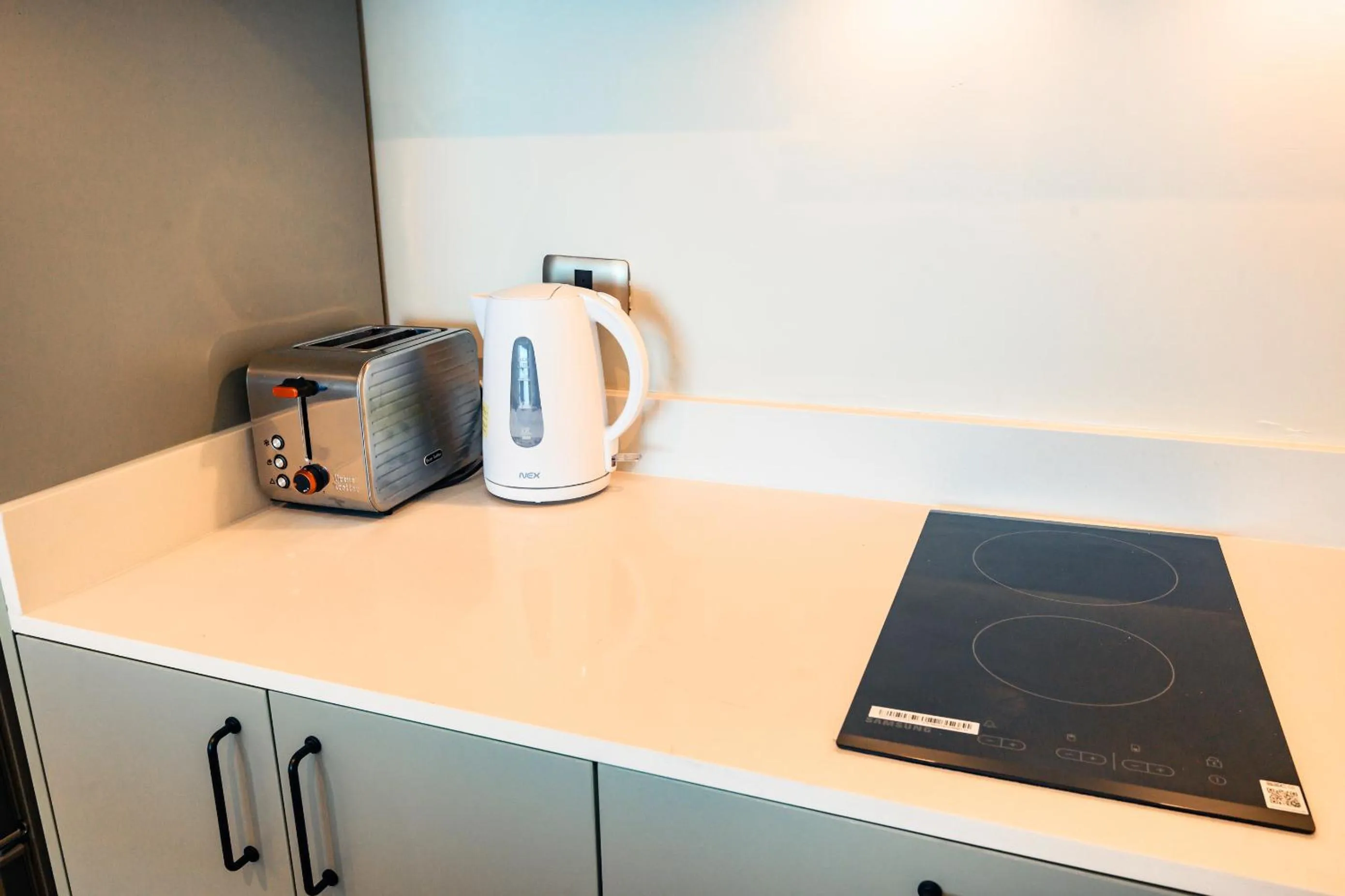 Kitchen or kitchenette in Studio 56 Apart Hotel by Terrado Iquique