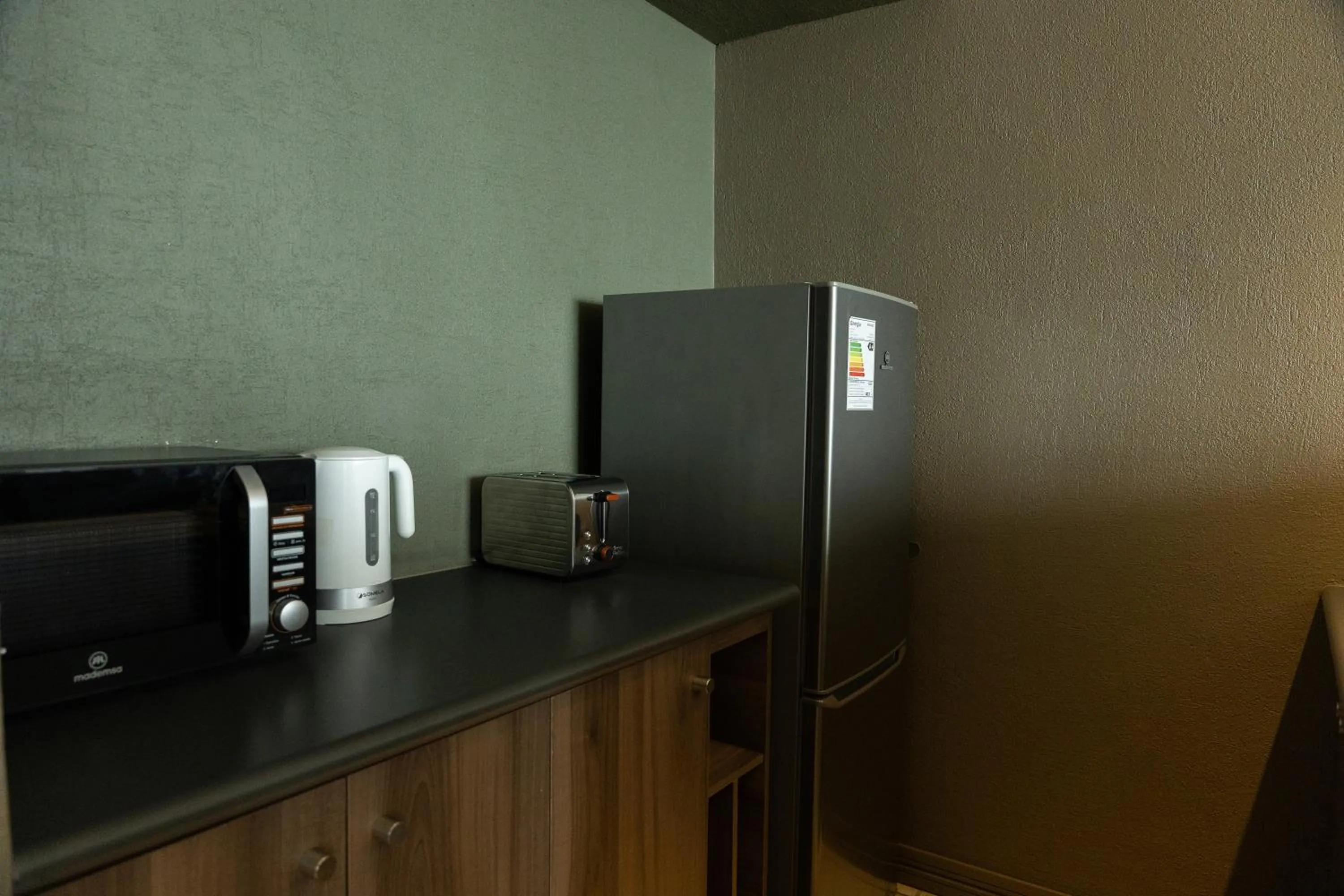 Kitchen or kitchenette in Studio 56 Apart Hotel by Terrado Iquique