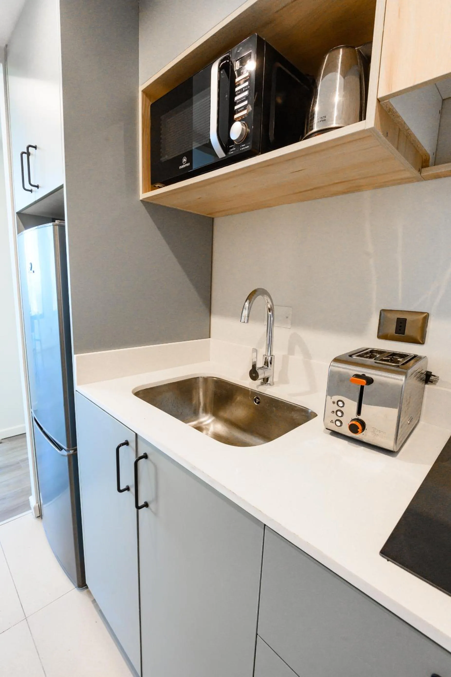 Kitchen or kitchenette in Studio 56 Apart Hotel by Terrado Iquique