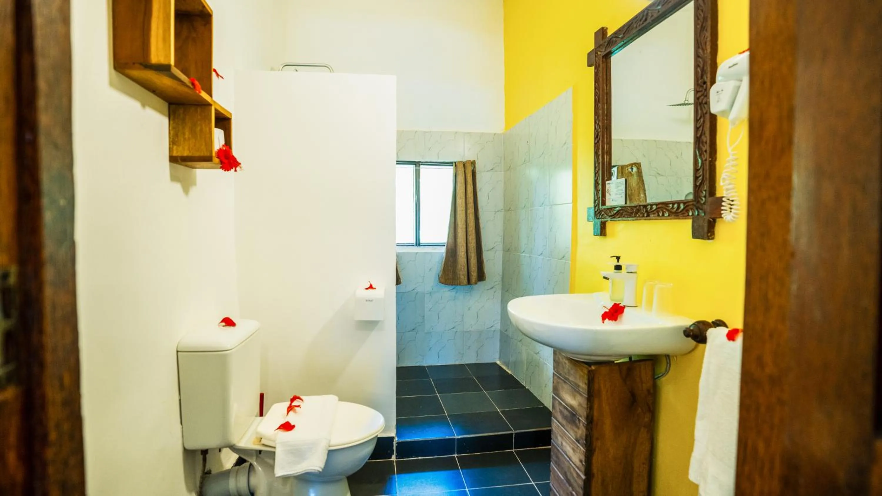 Shower in Paradise Beach Resort & Spa