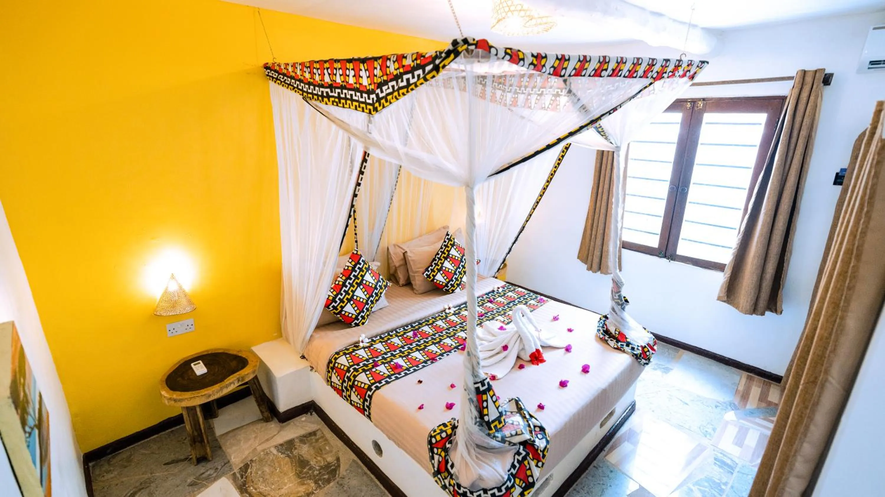 Bed in Paradise Beach Resort & Spa