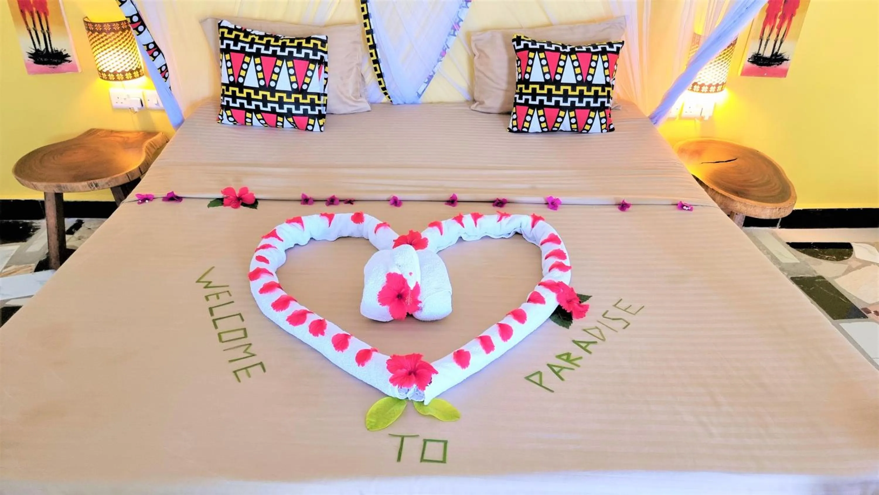 Bed in Paradise Beach Resort & Spa