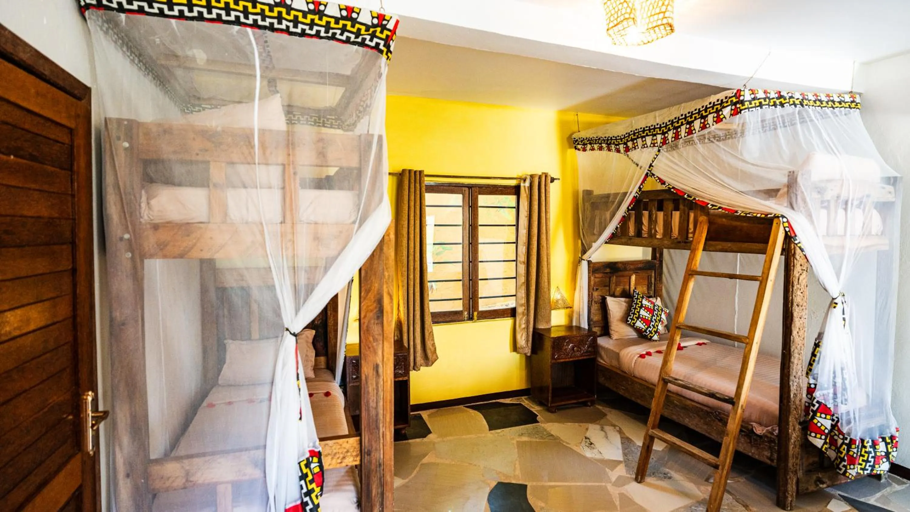 Bed in Paradise Beach Resort & Spa