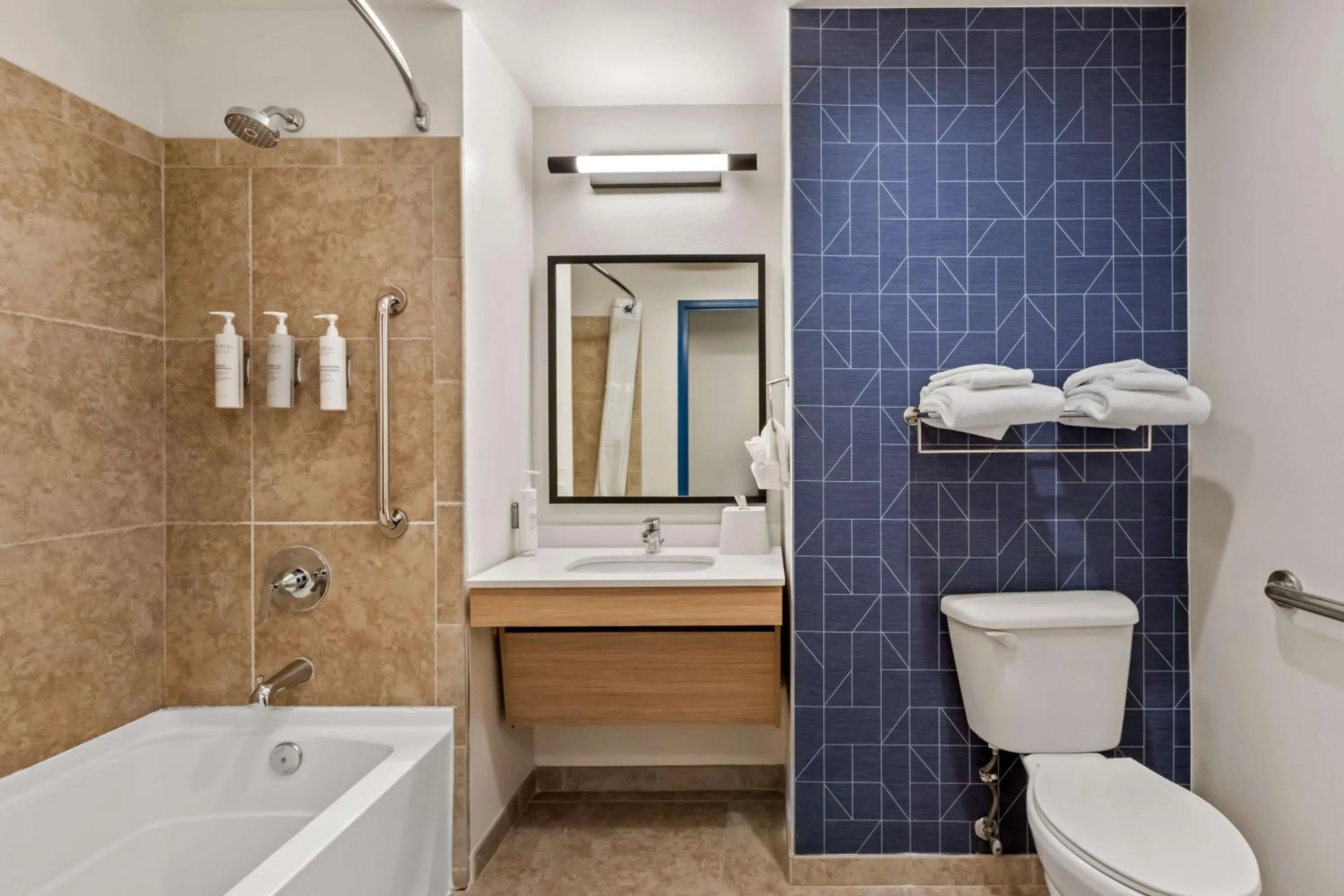 Bathroom in Legacy Inn & Suites