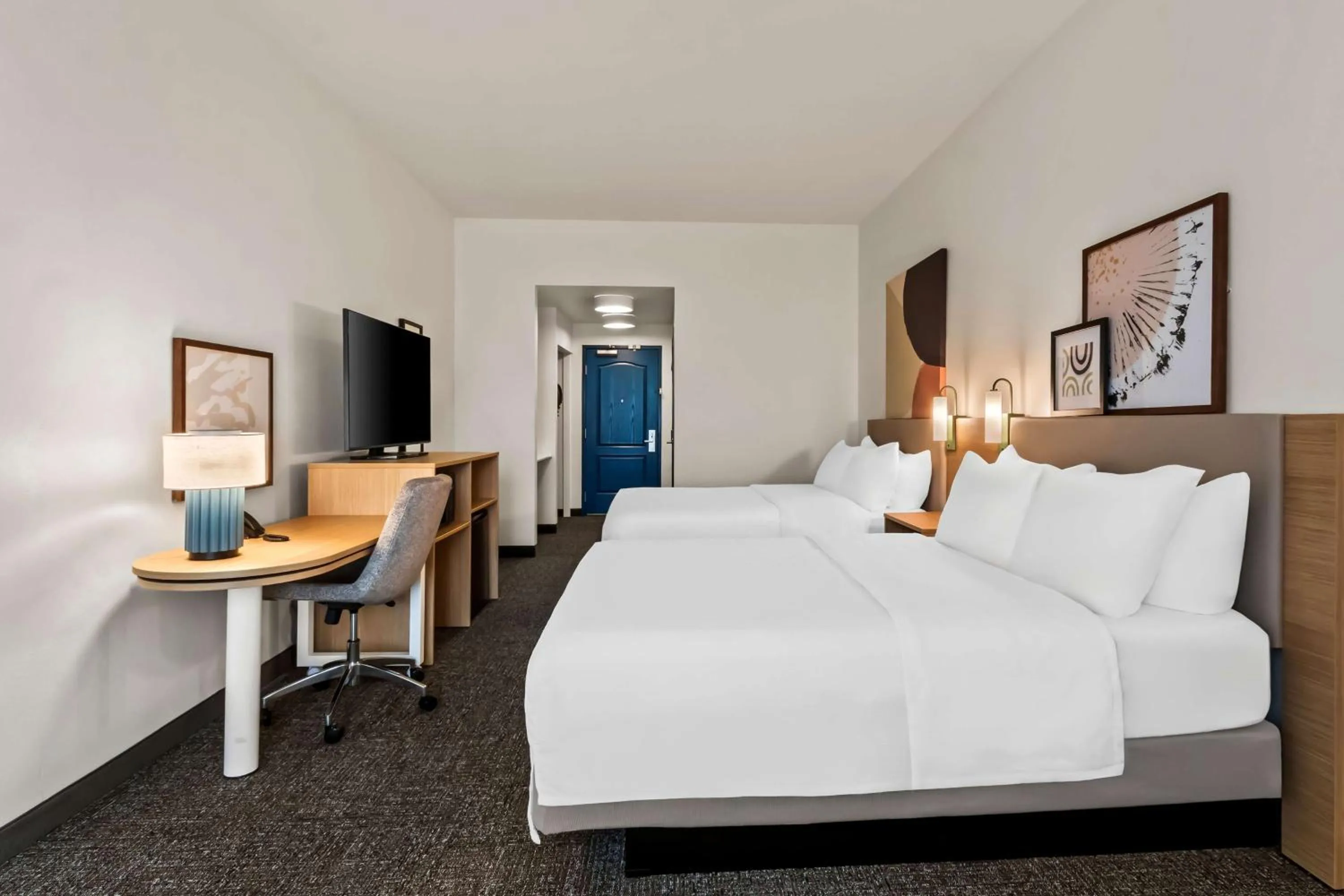 Bed in Legacy Inn & Suites