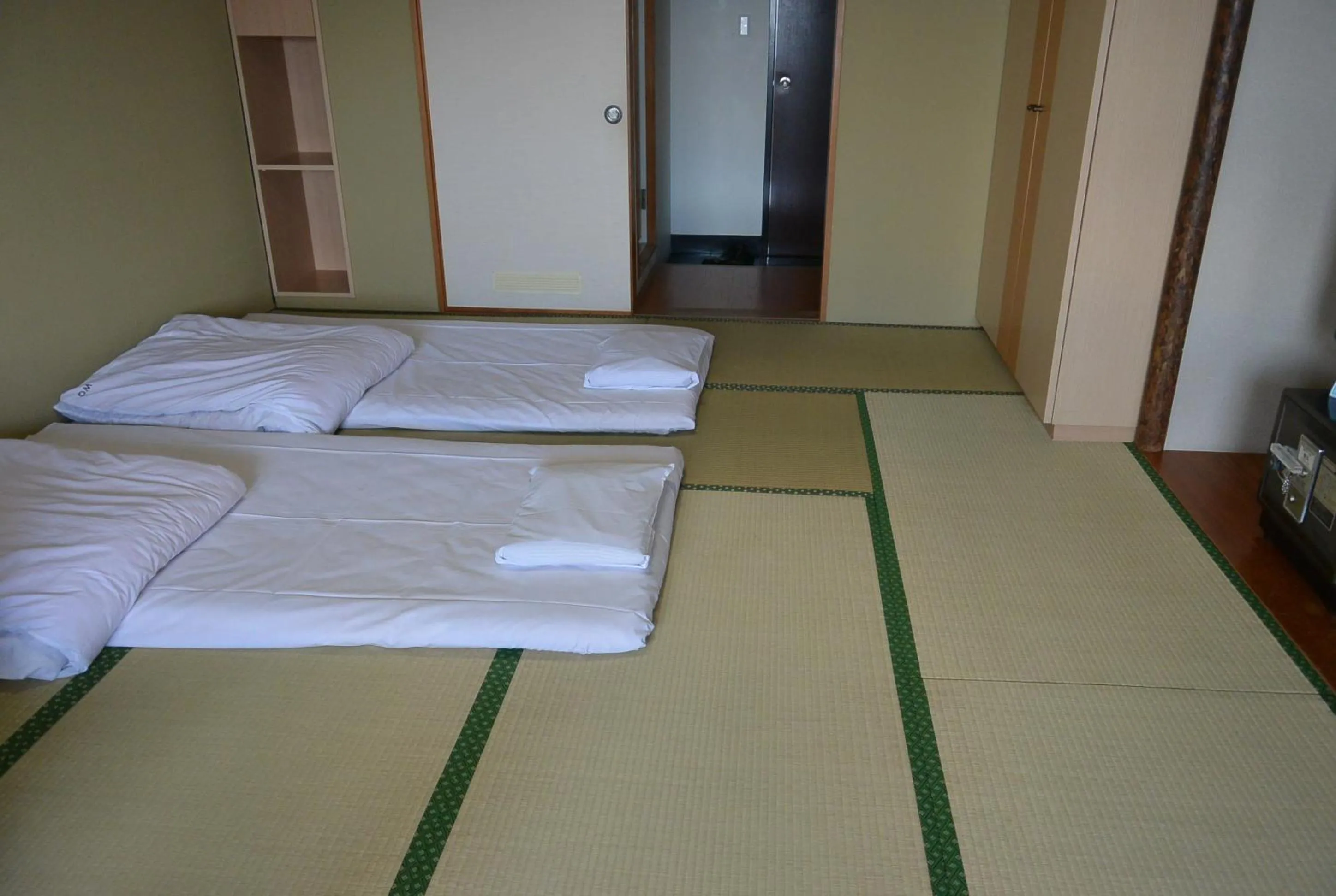 Bed in Toya Kanko Hotel