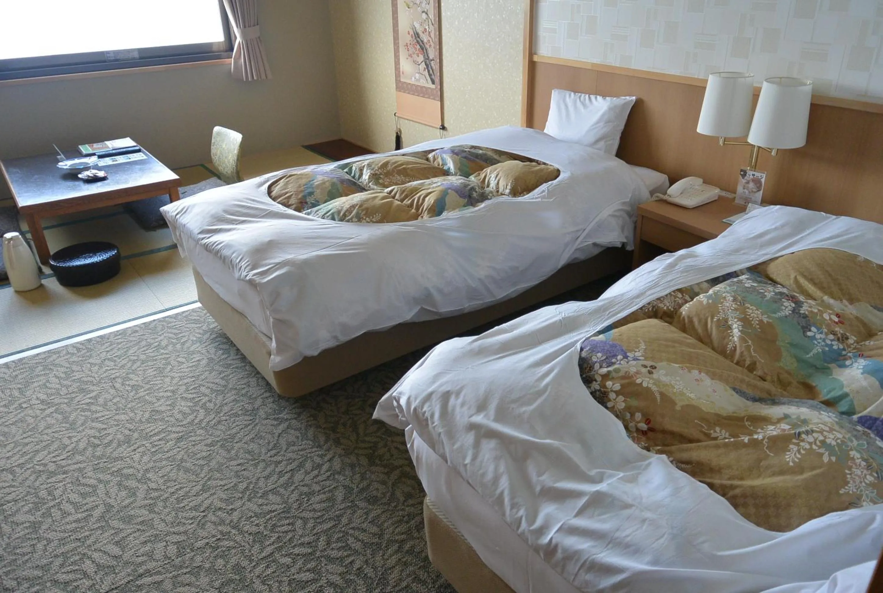 Bed in Toya Kanko Hotel
