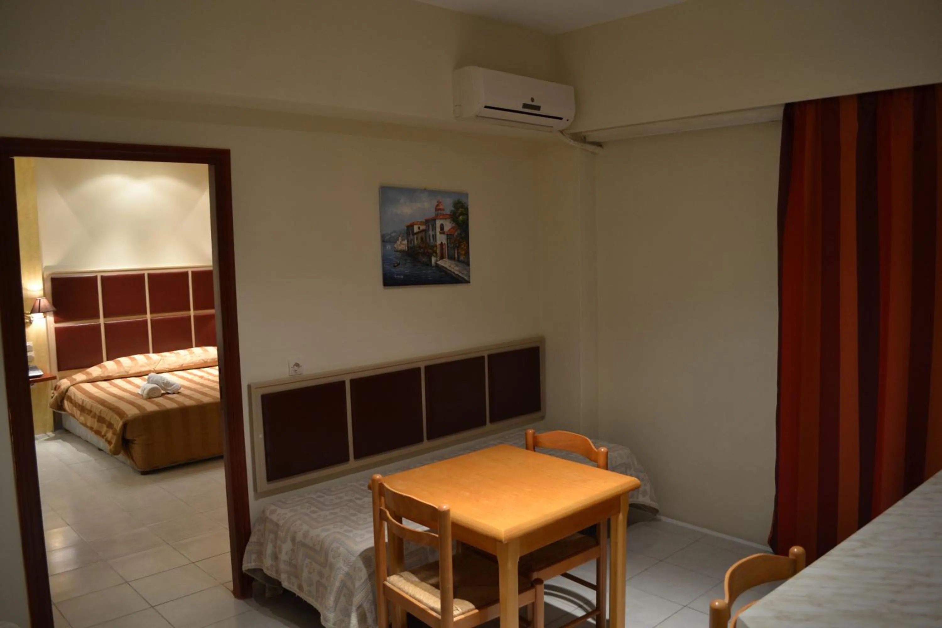 Bed in Panorama Hotel Apartments