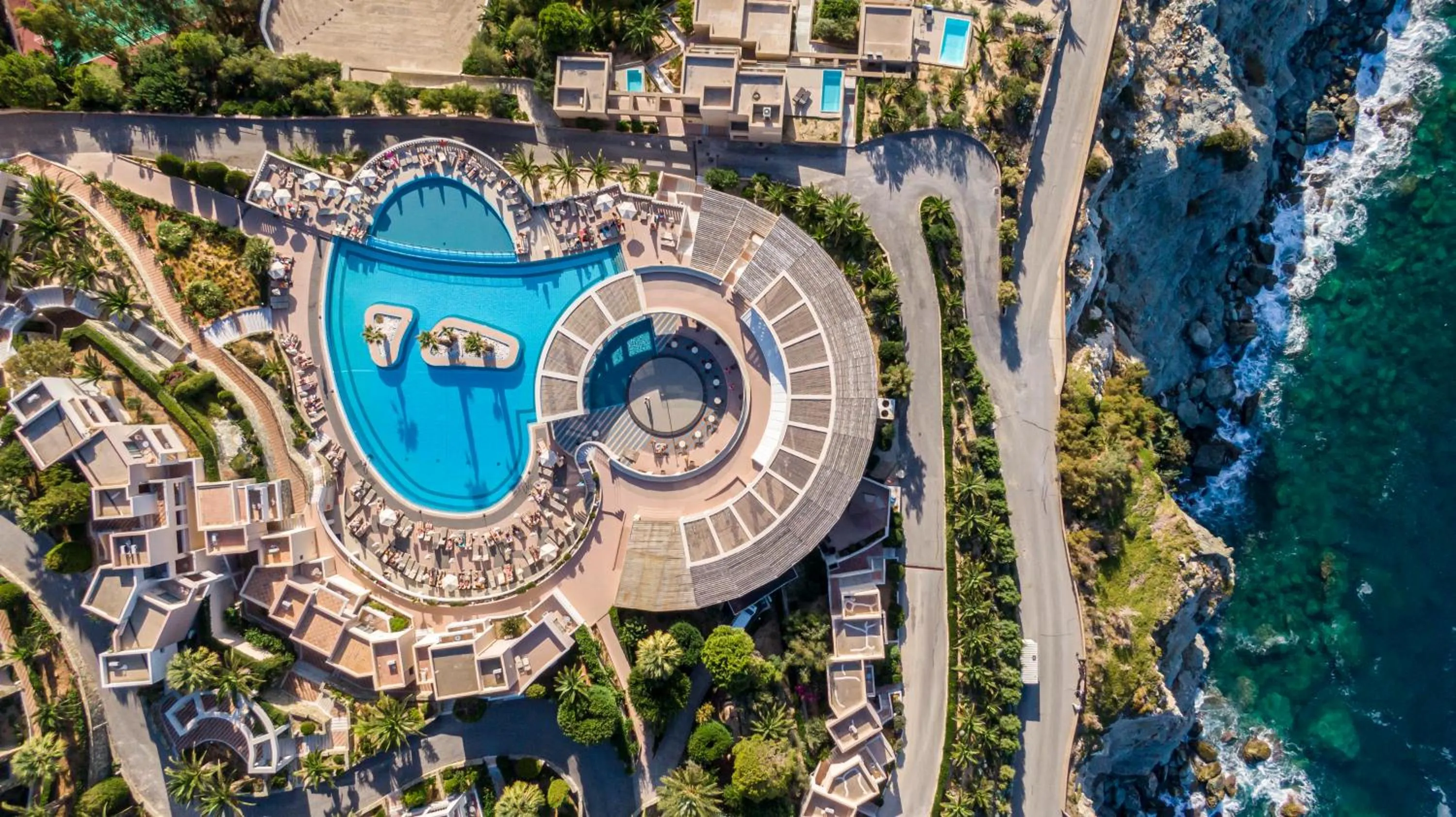 Pool view in Athina Palace Resort & Spa