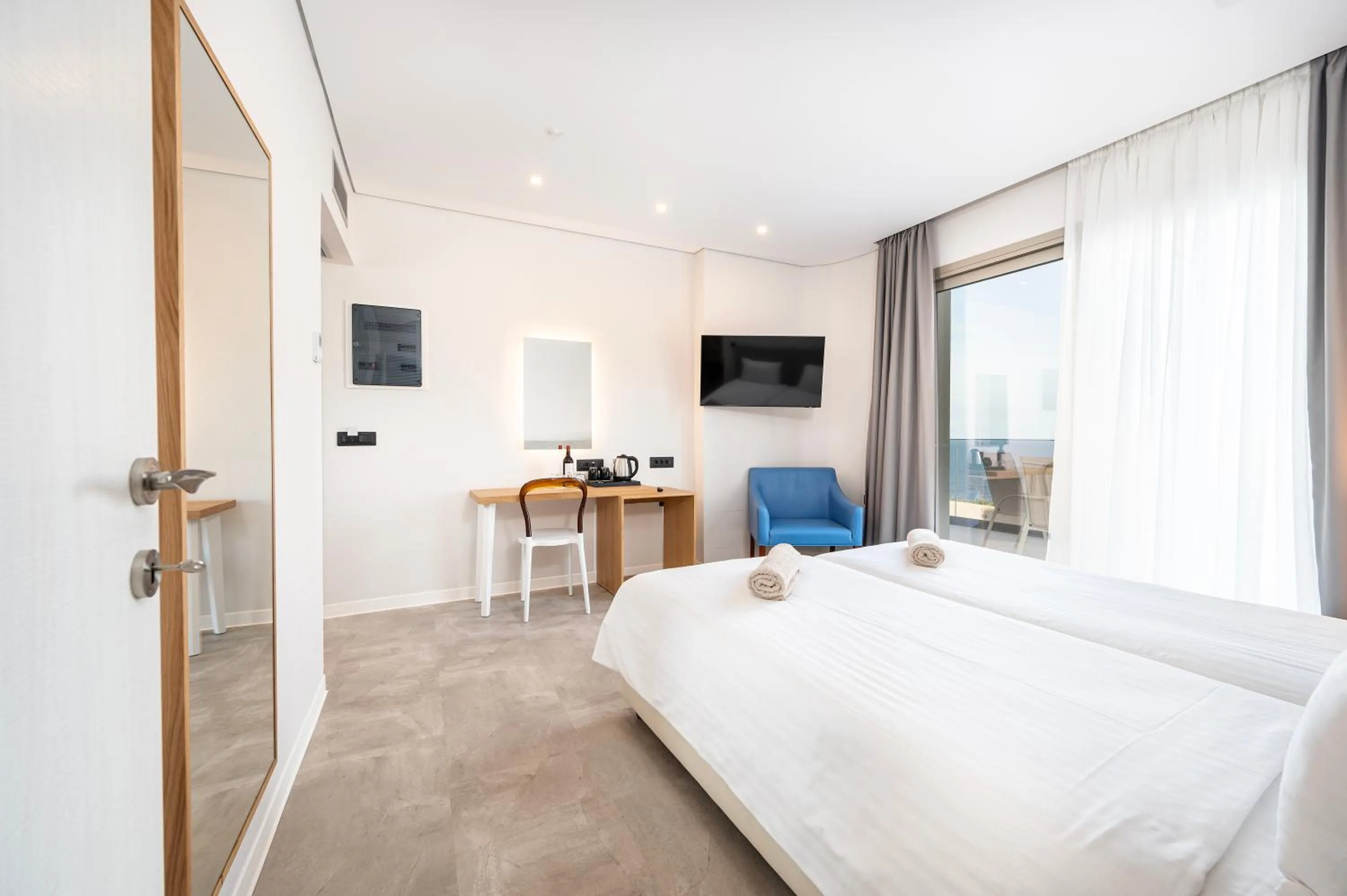 Bed in Athina Palace Resort & Spa