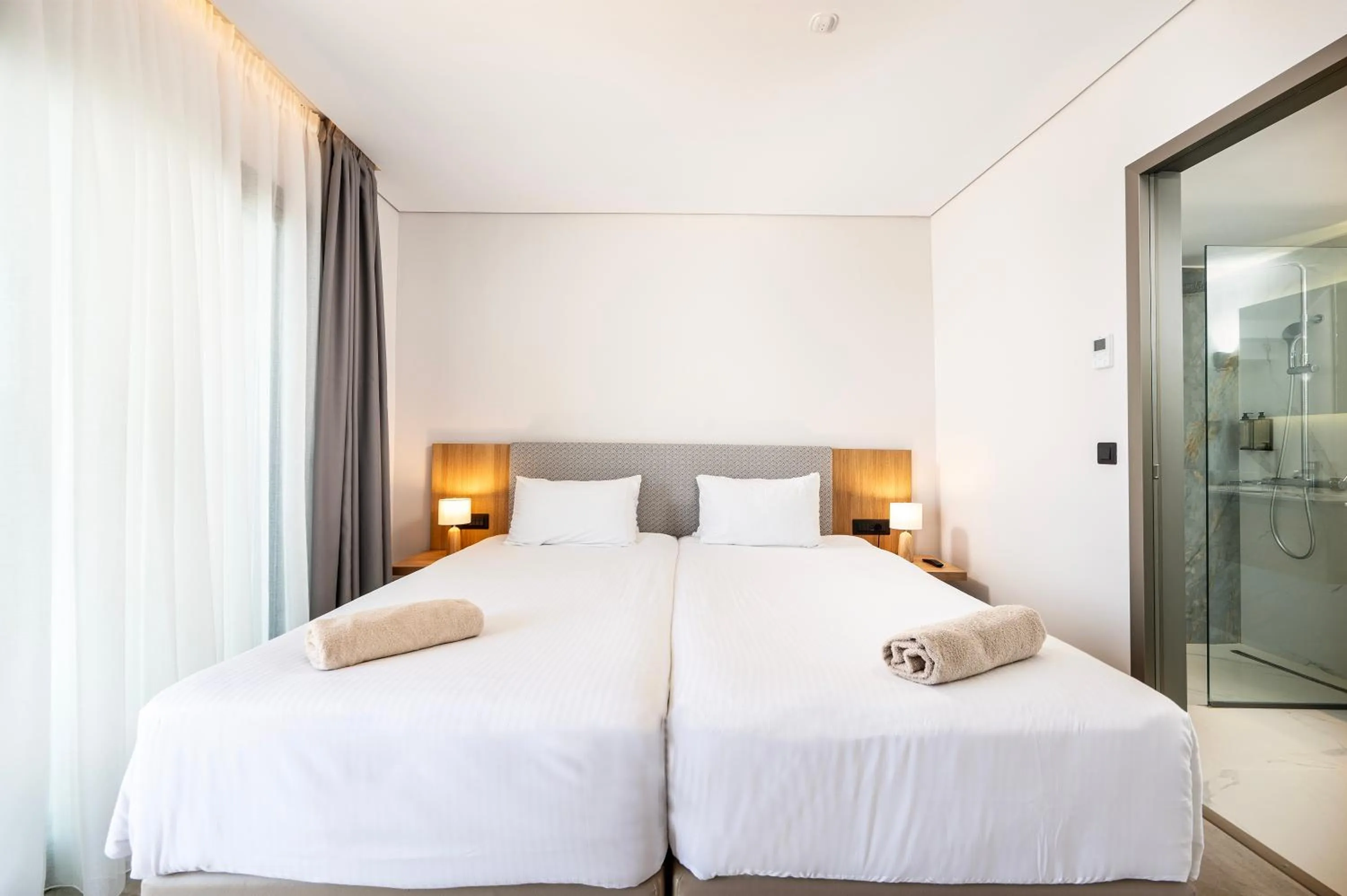 Bed in Athina Palace Resort & Spa