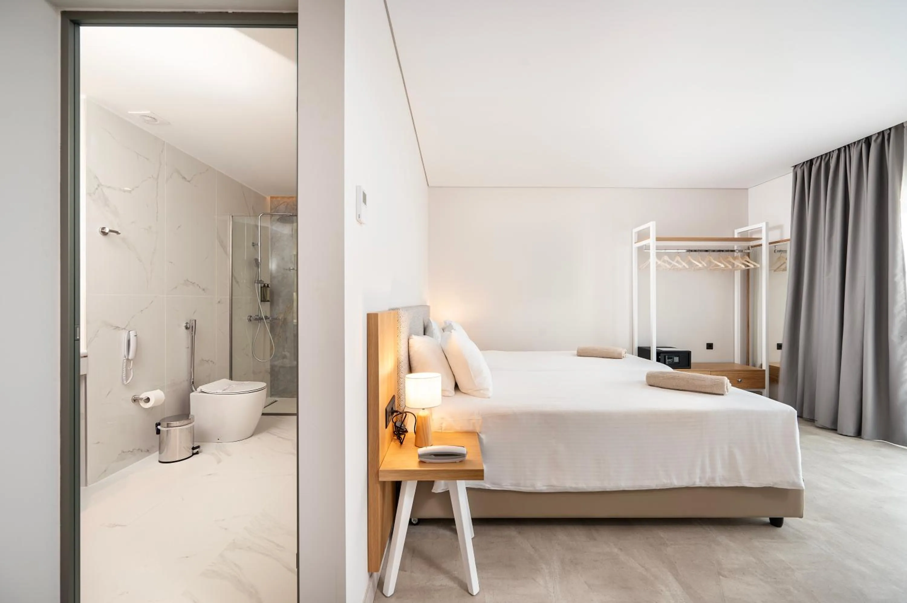 Bed in Athina Palace Resort & Spa