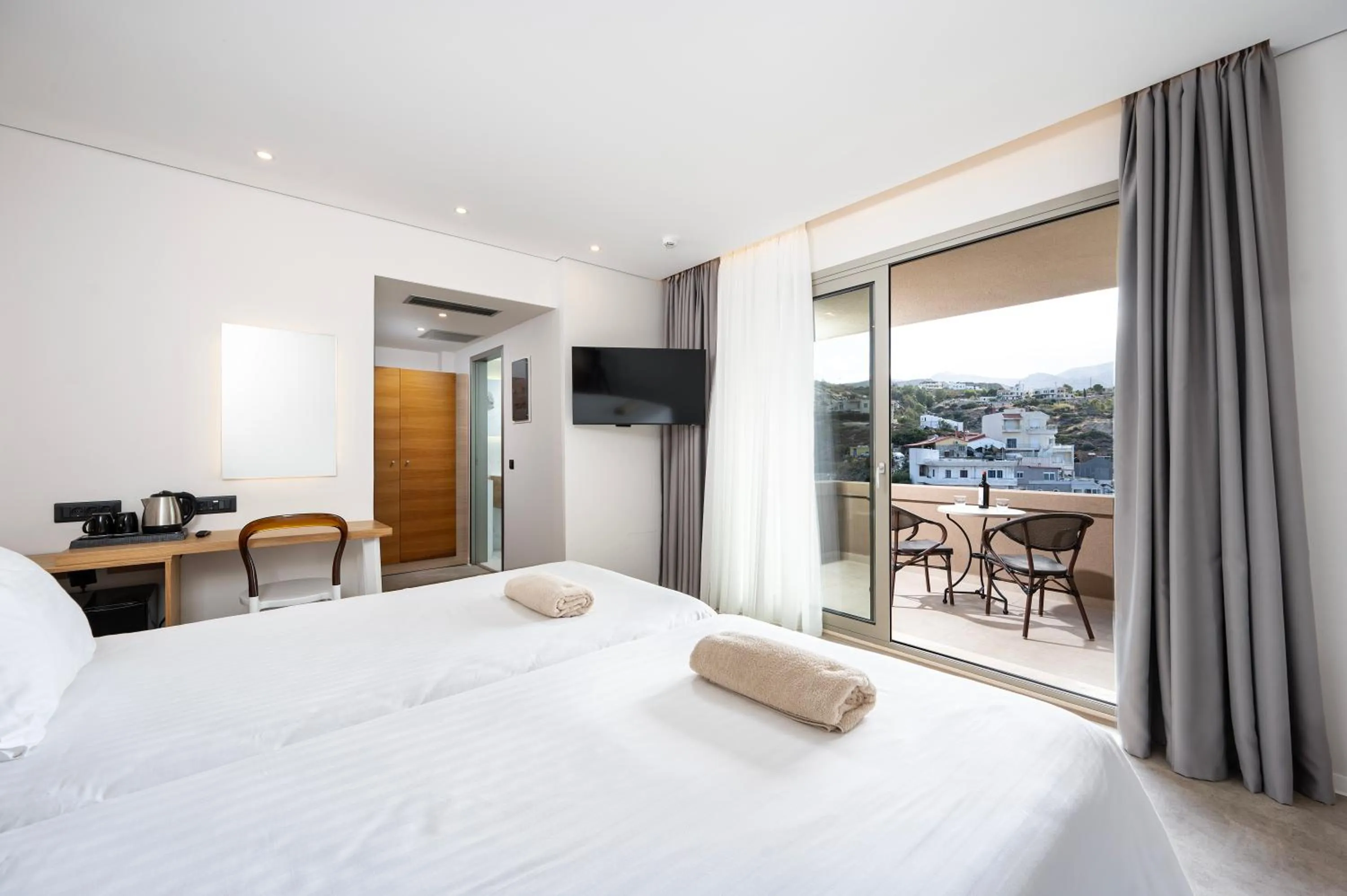 Bed in Athina Palace Resort & Spa