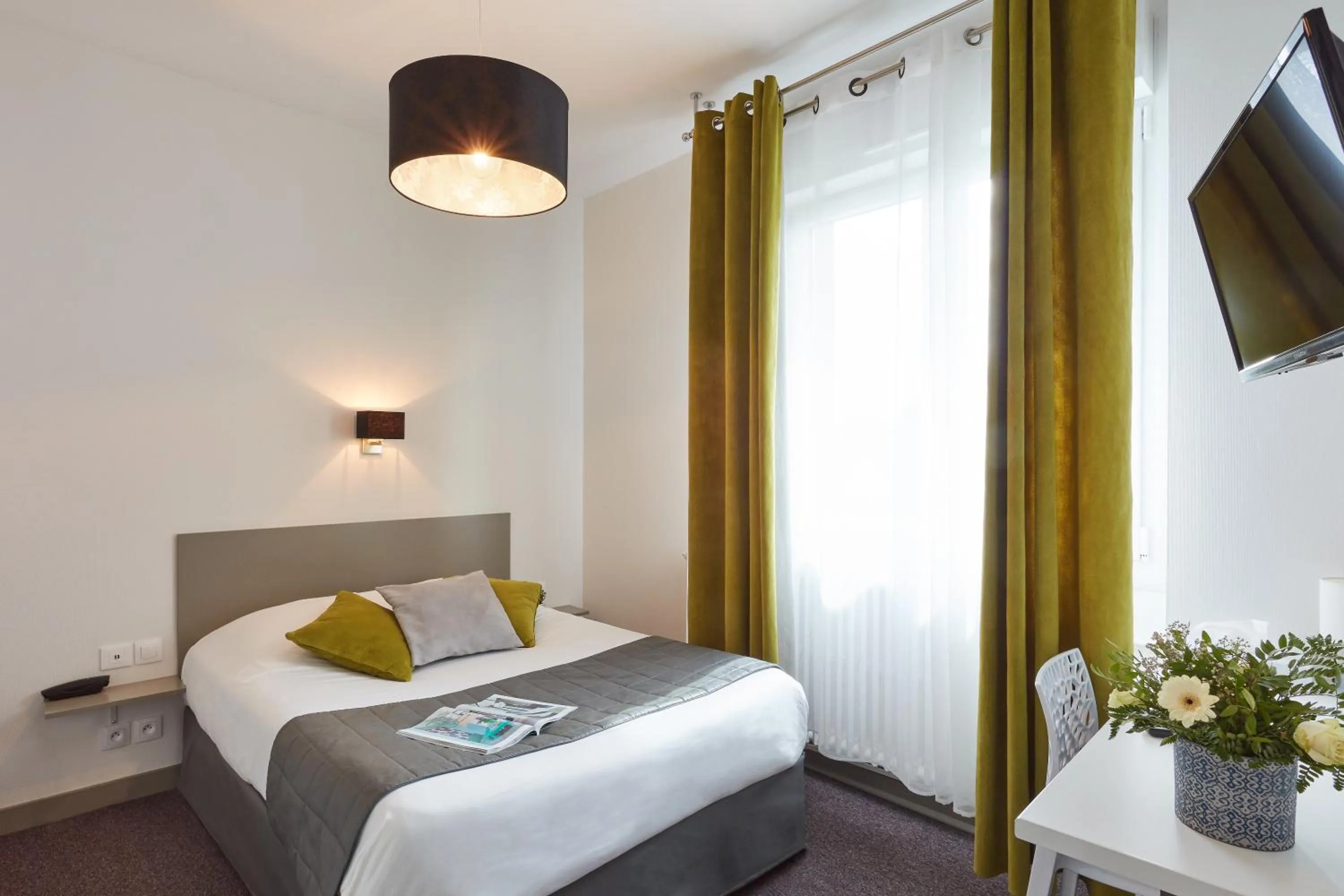 Bed in Hotel De La Pommeraie