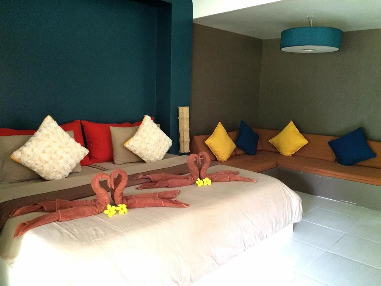 Bed in Phayam Cottage Resort