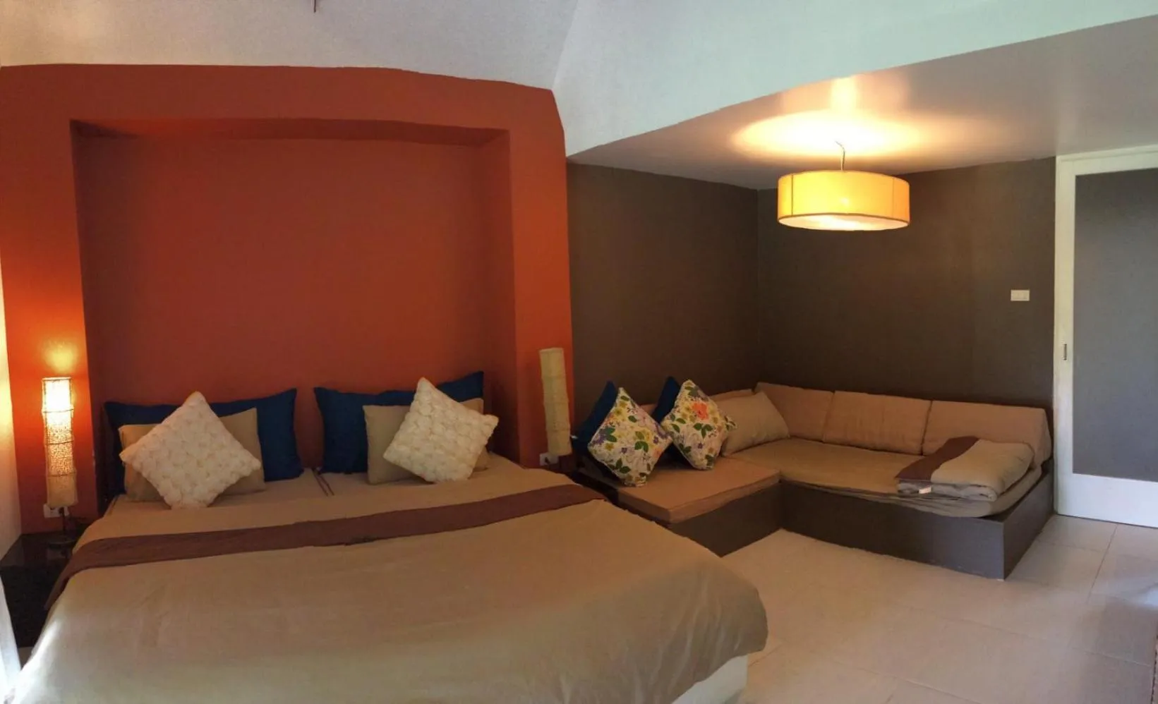 Bed in Phayam Cottage Resort