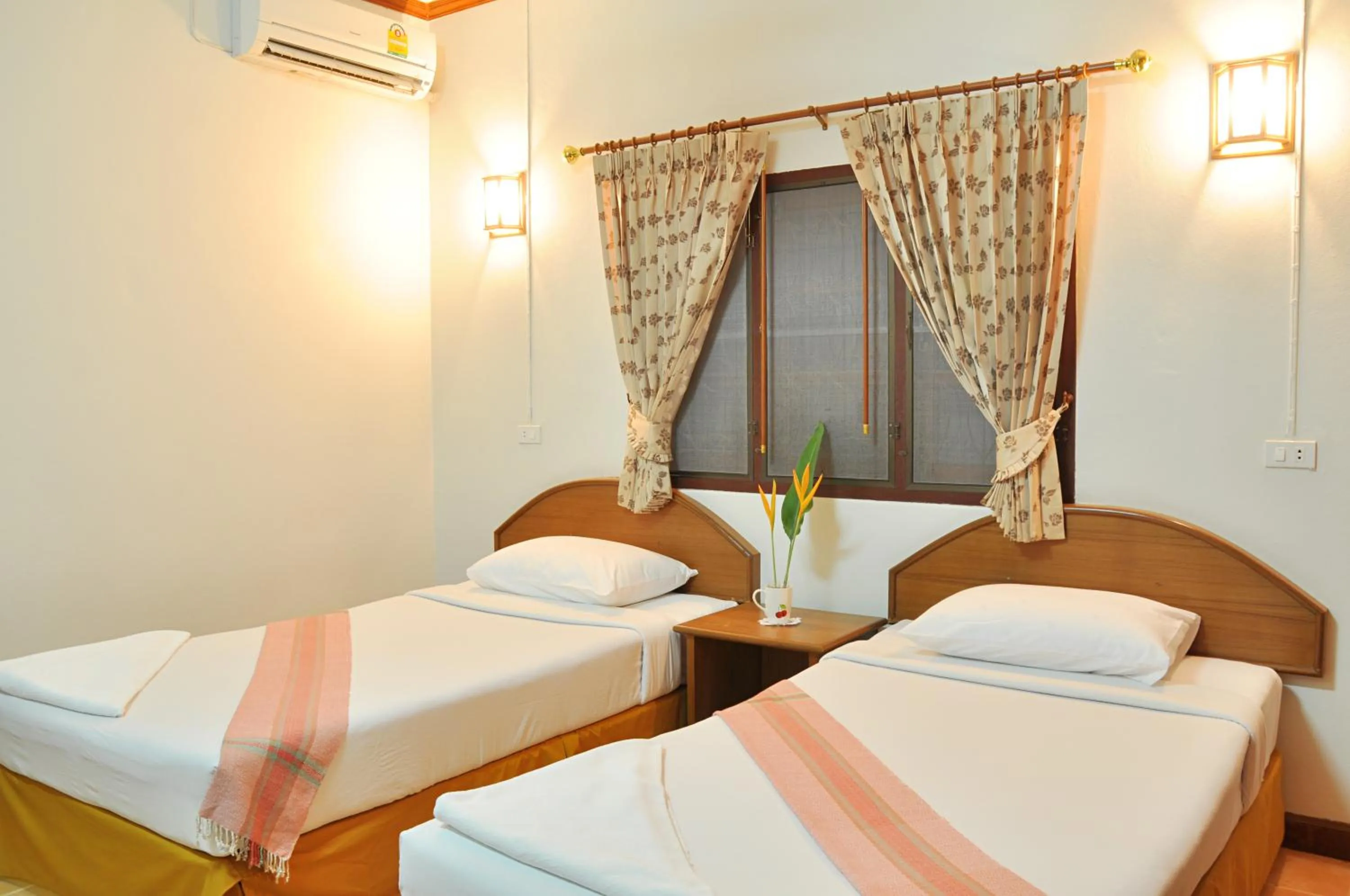 Bed in Mira Mare Resort Koh Samui