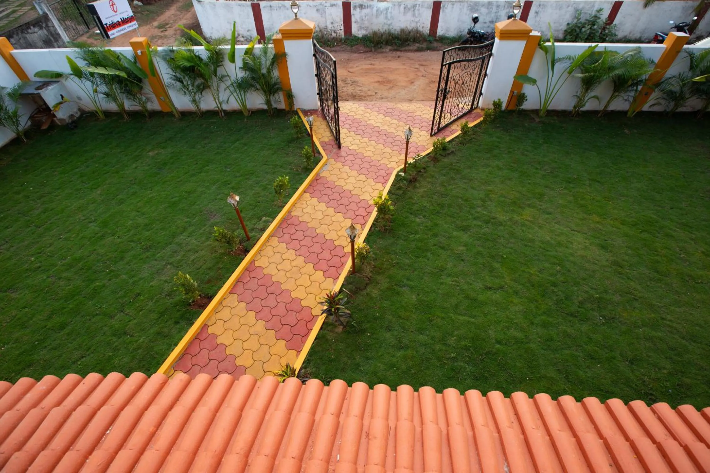 Garden view in Tridiva Morjim 150 Meters to Morjim Beach