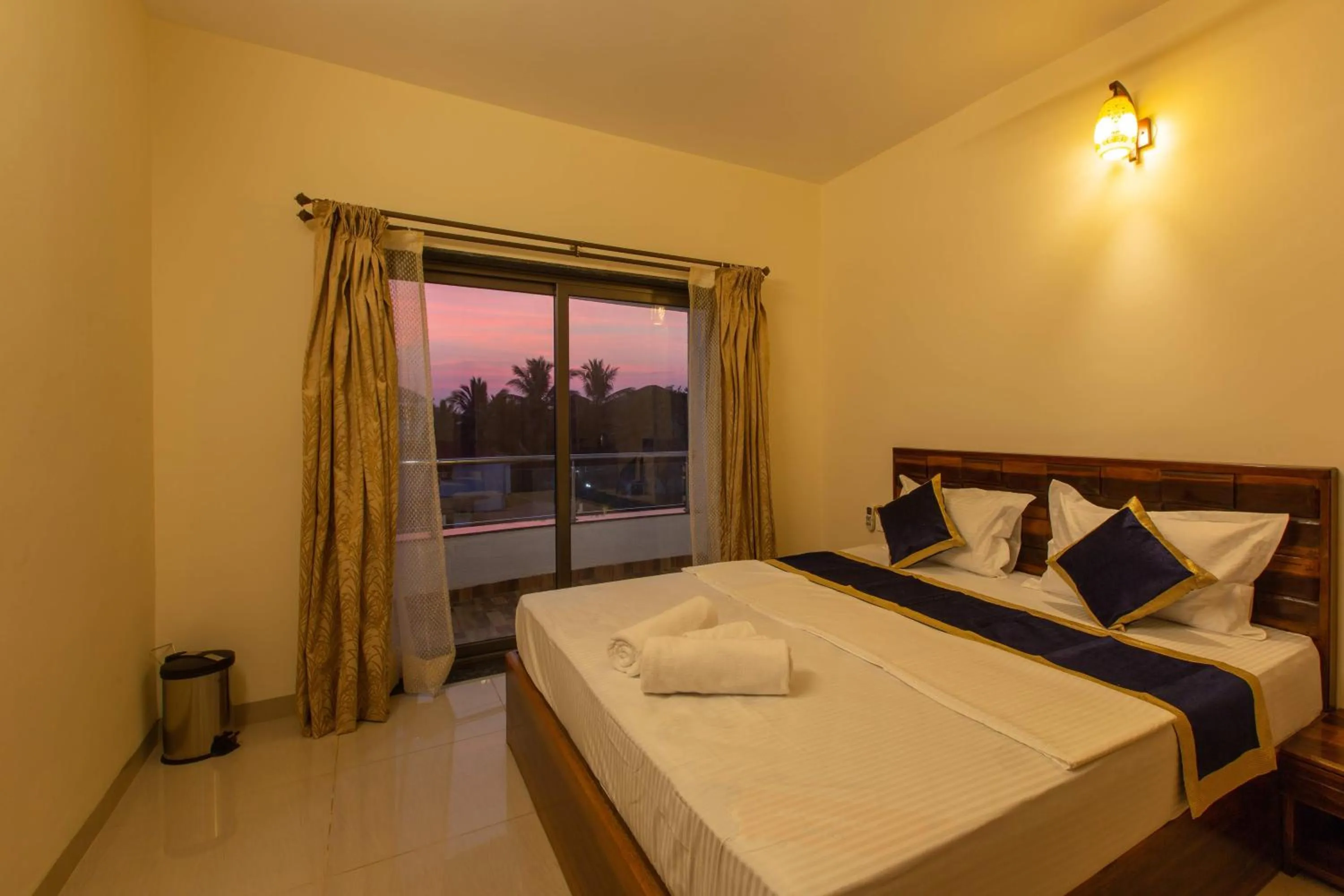 Balcony/Terrace, Bed in Tridiva Morjim 150 Meters to Morjim Beach