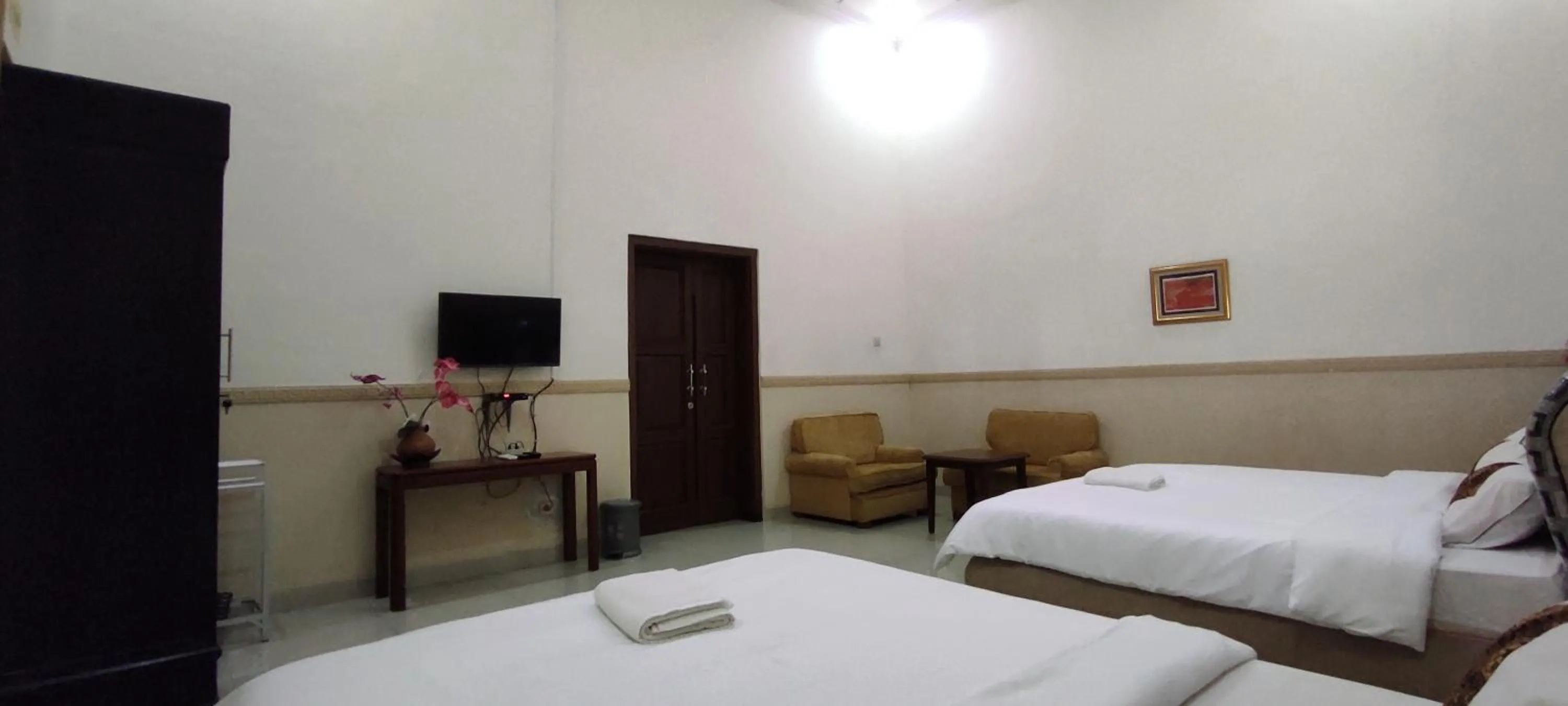 Bed in Ndalem Katong Guest House Ponorogo