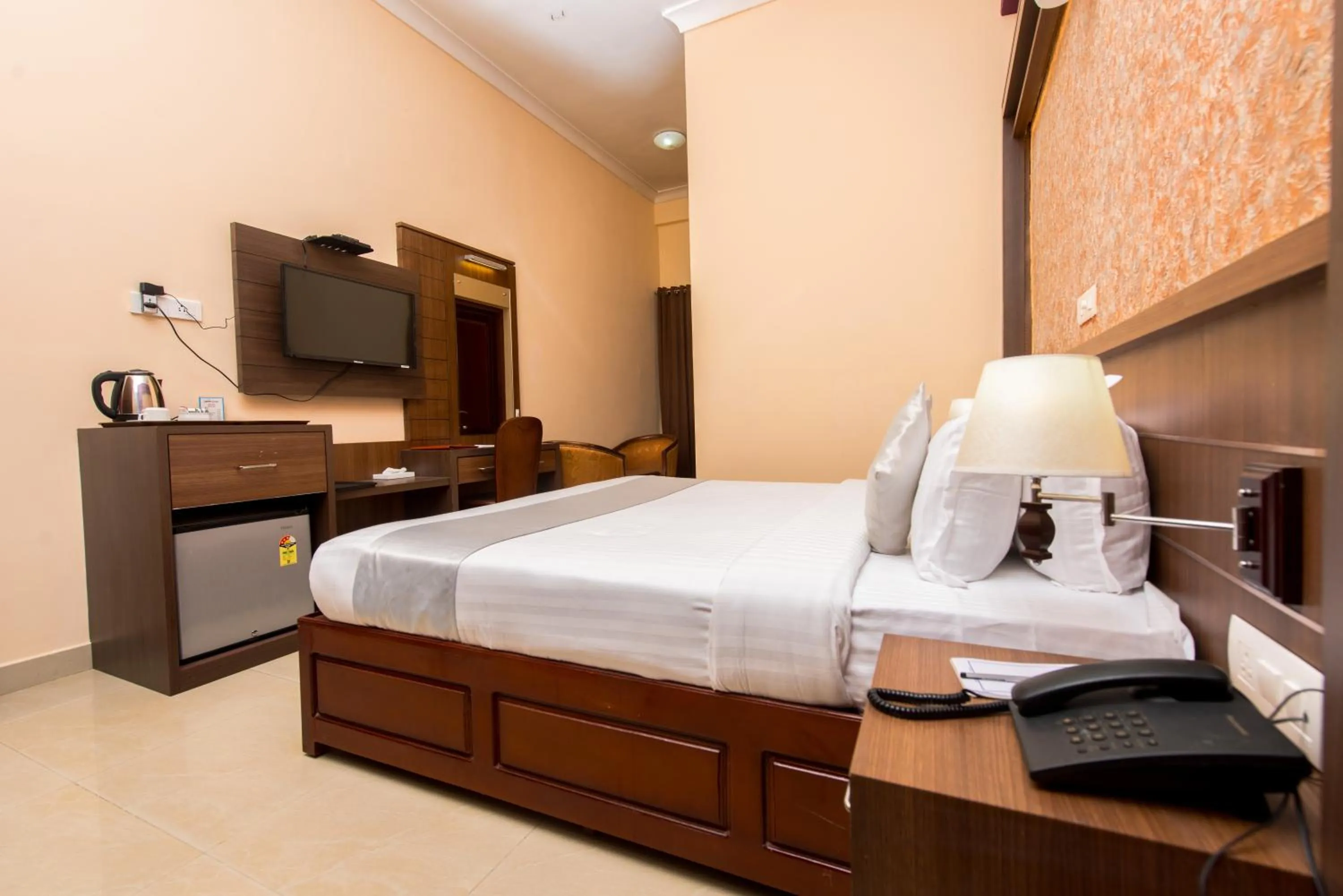 Bed in Kallada Golden Hotel