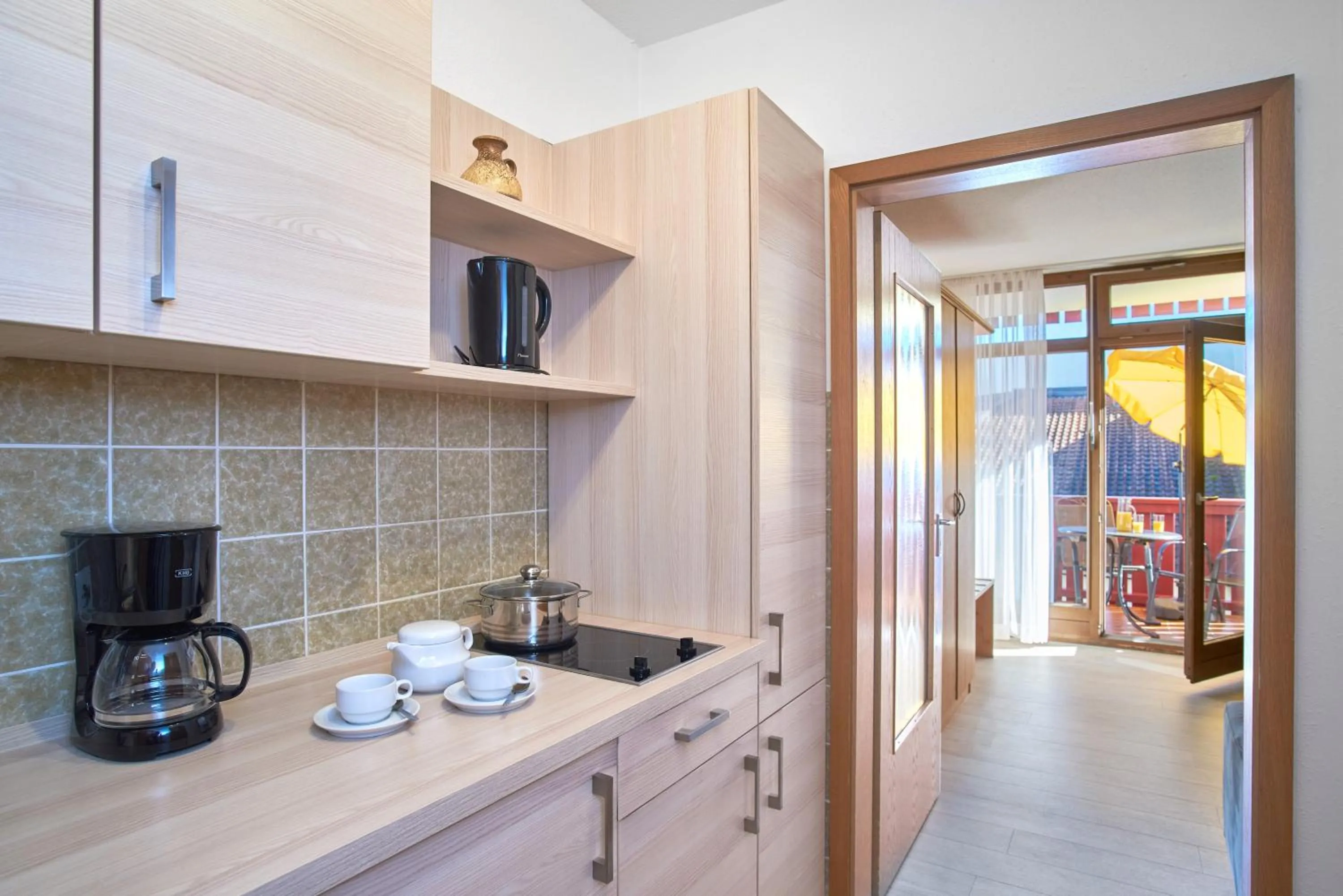 Kitchen or kitchenette in Apparthotel Minerva Diana Octavia