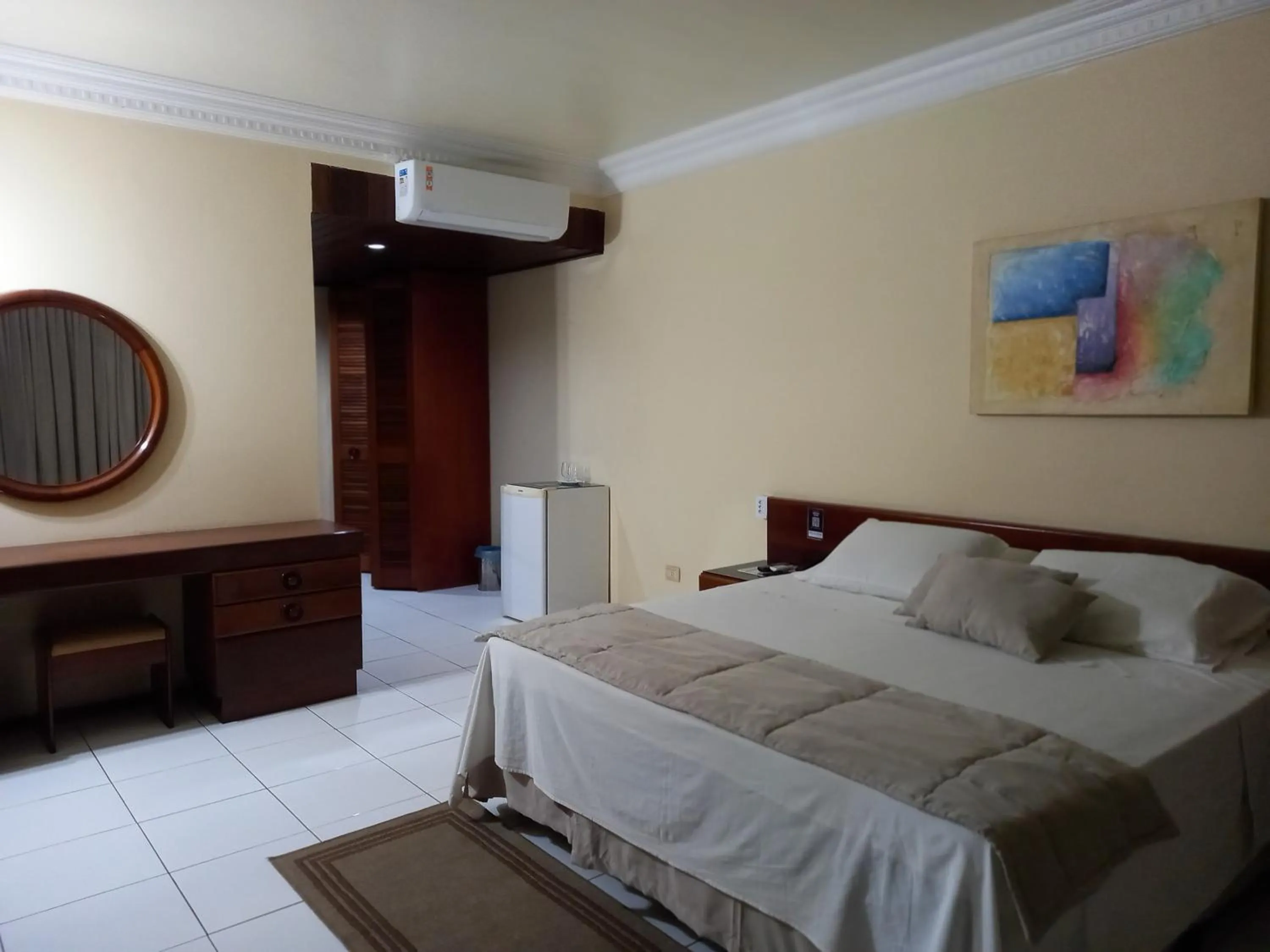 Seating area, Bed in Posseidon Hotel