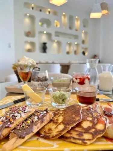 Breakfast in Suites Hôtel Les Charmilles & Spa