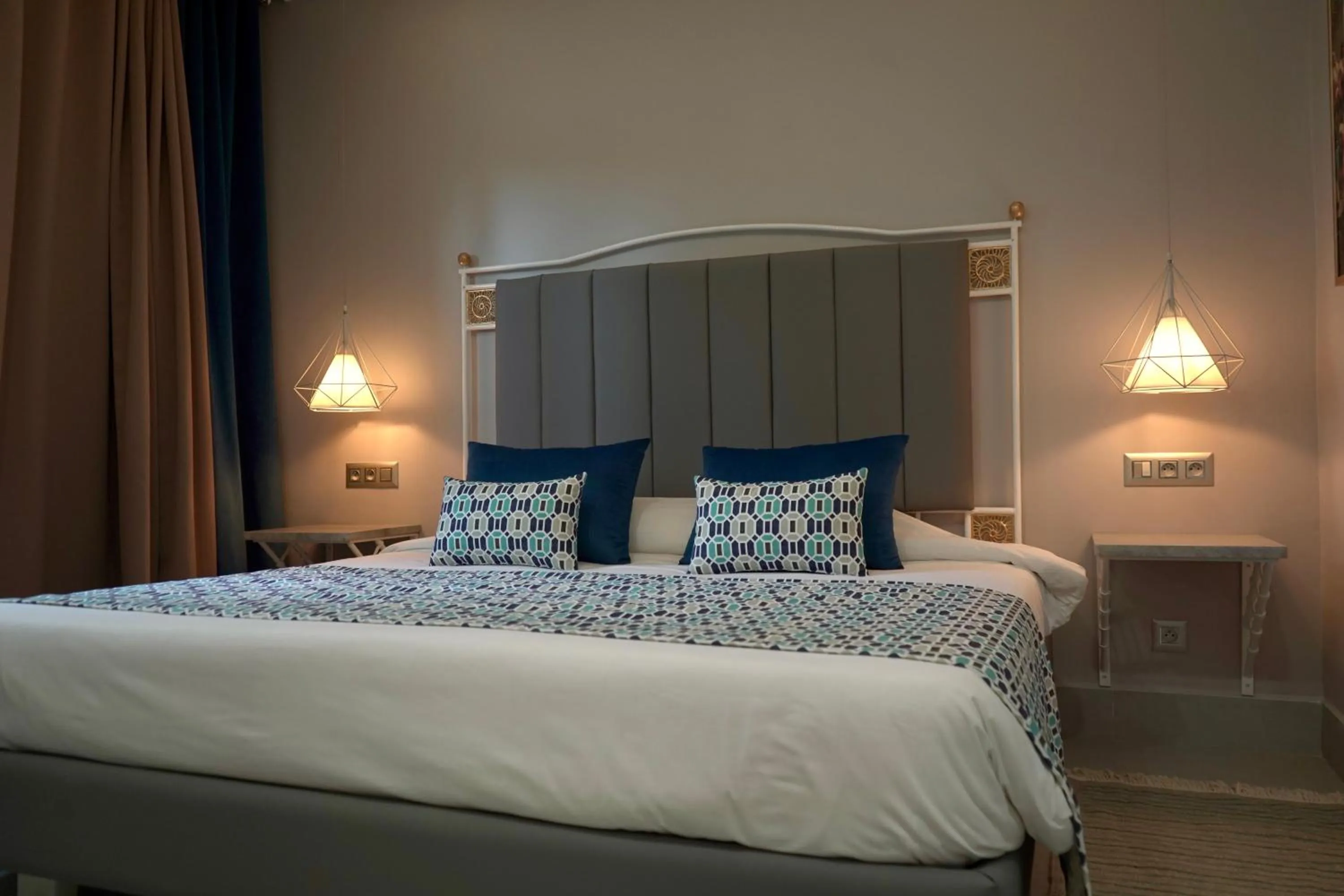 Bedroom, Bed in Suites Hôtel Les Charmilles & Spa