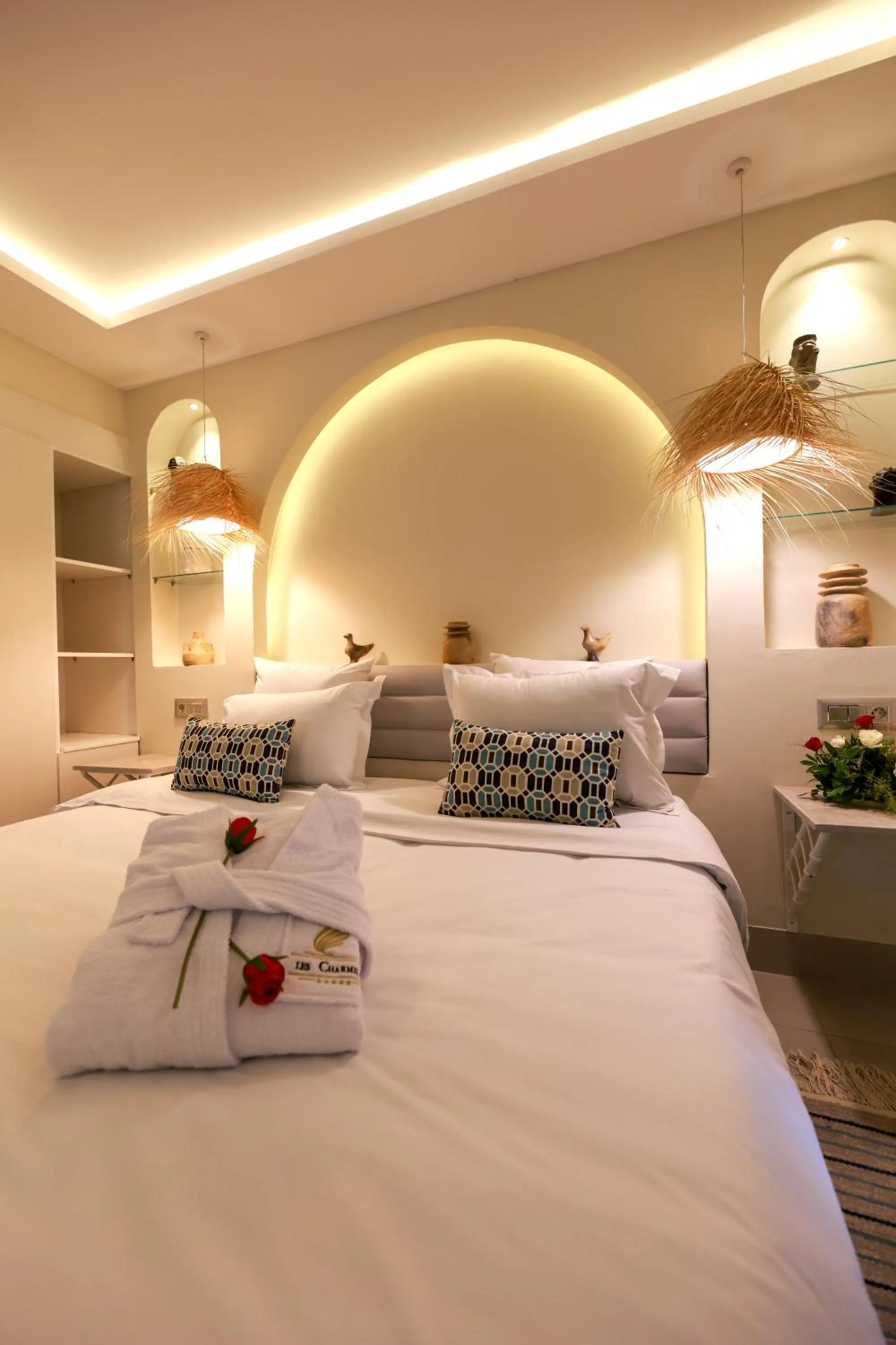 Bedroom in Suites Hôtel Les Charmilles & Spa