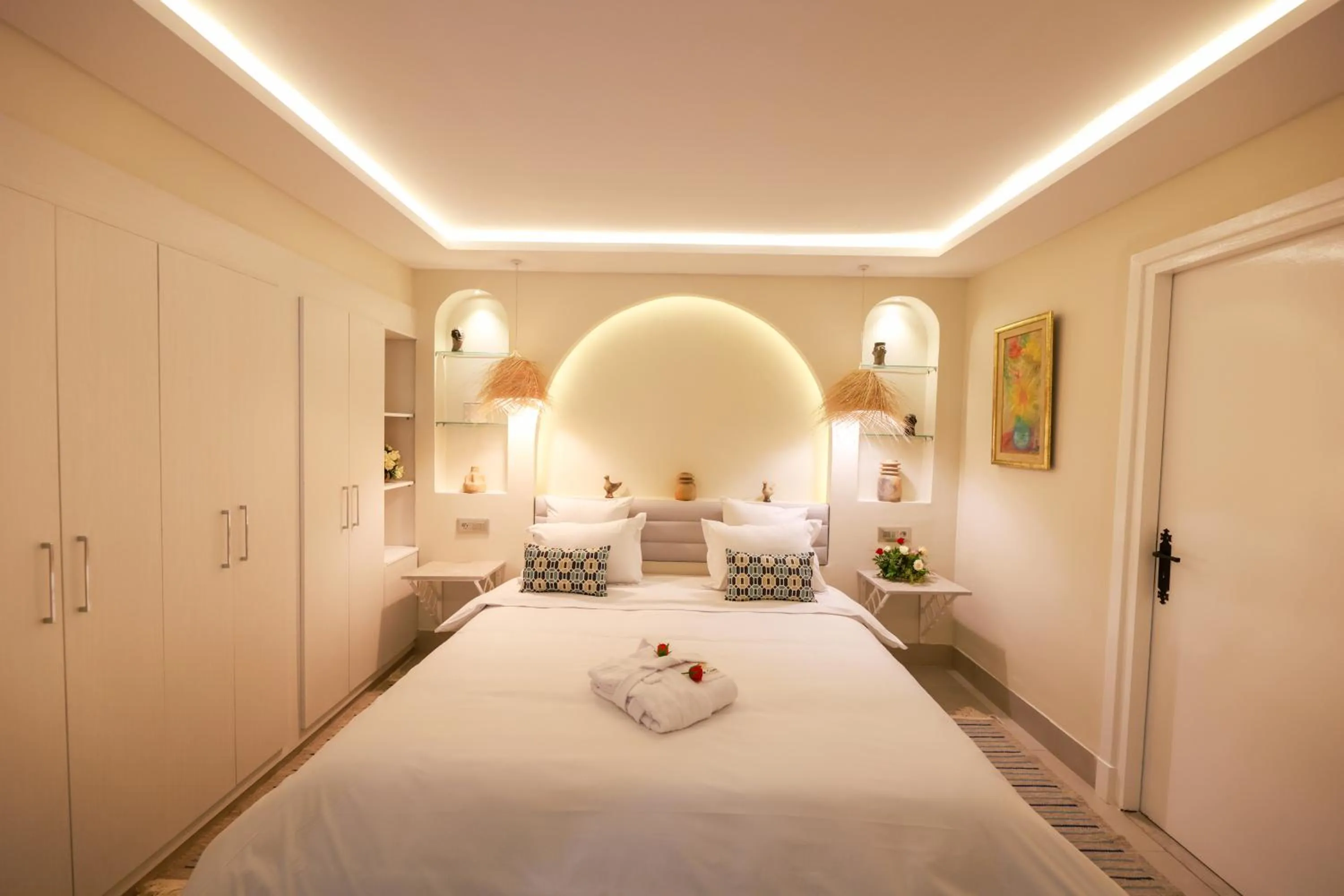 Bedroom in Suites Hôtel Les Charmilles & Spa