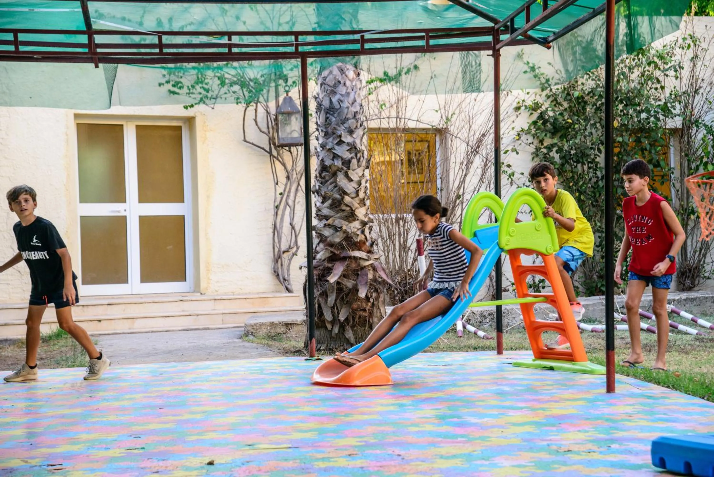 Children play ground in Suites Hôtel Les Charmilles & Spa